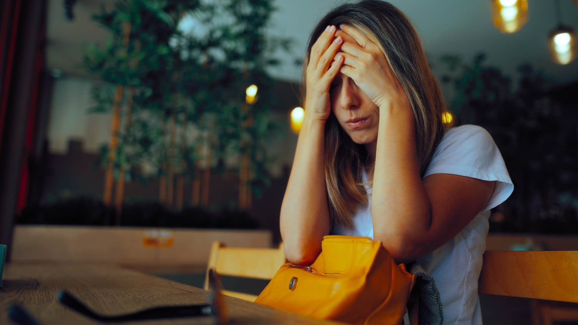 stressed woman feeling pressured to follow social norms