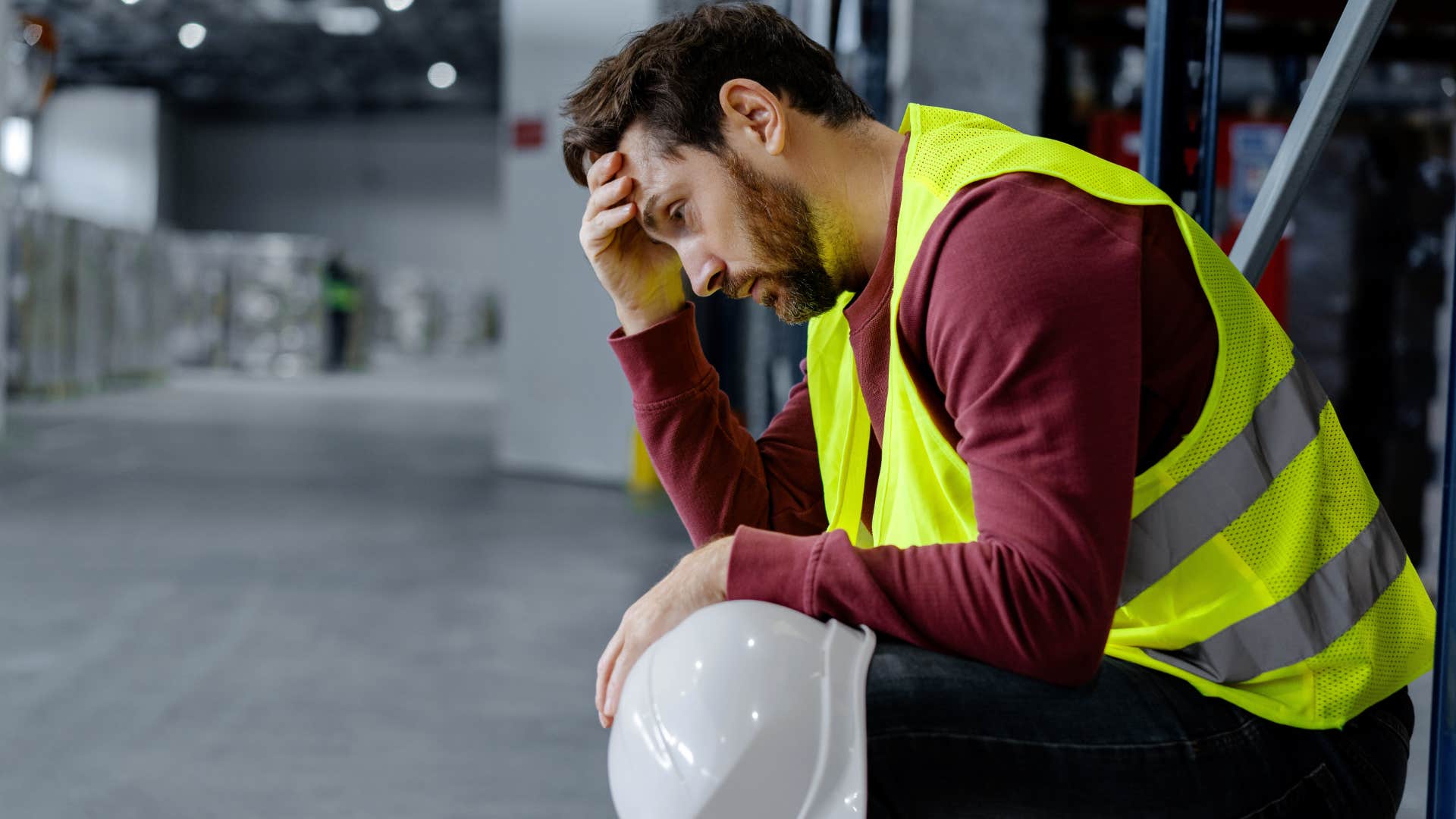 Man thinking about how expectations are high, but wages are low at work.