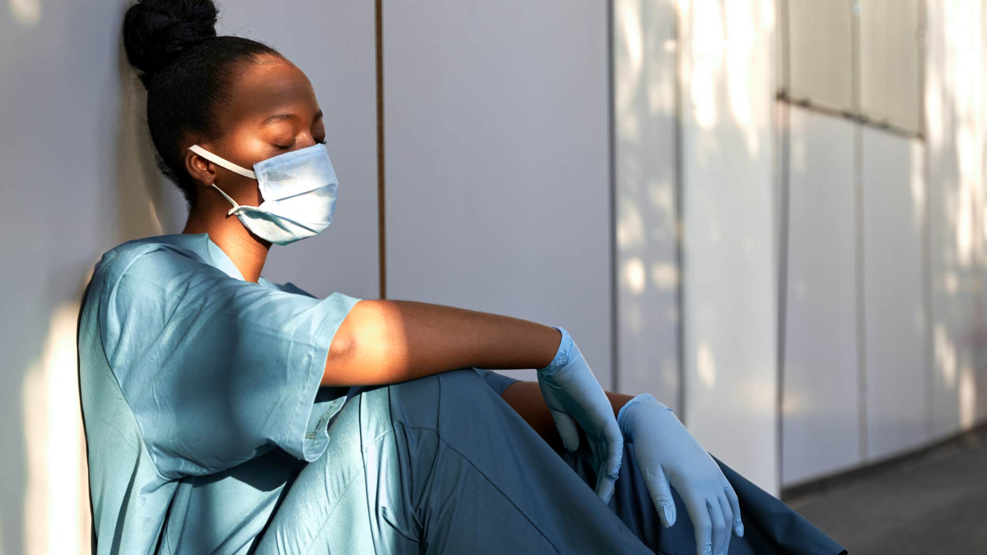 Woman struggling with purpose at her healthcare job.