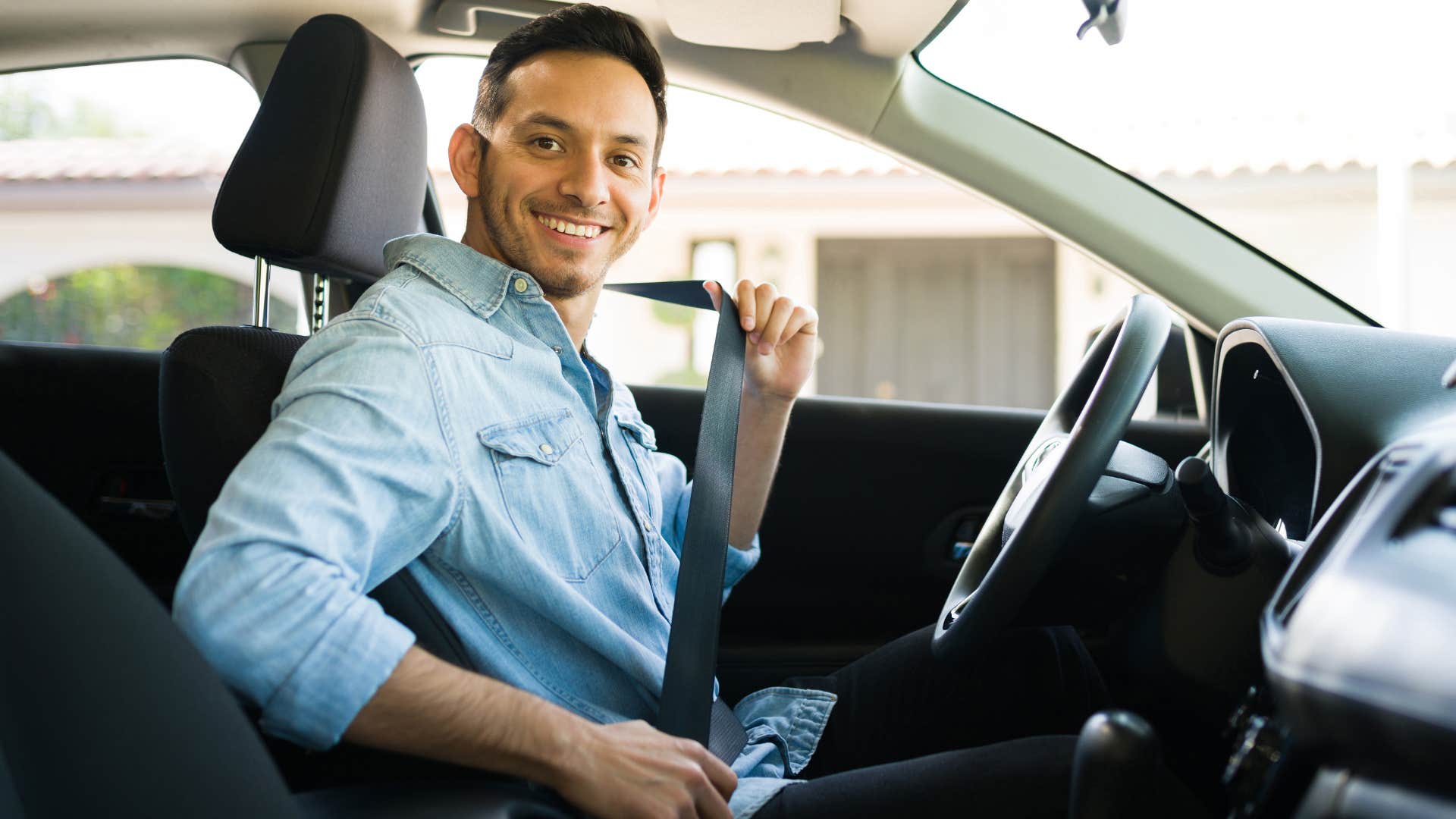a gen z man puts his seatbelt on after being raised his gen x parents did not use it