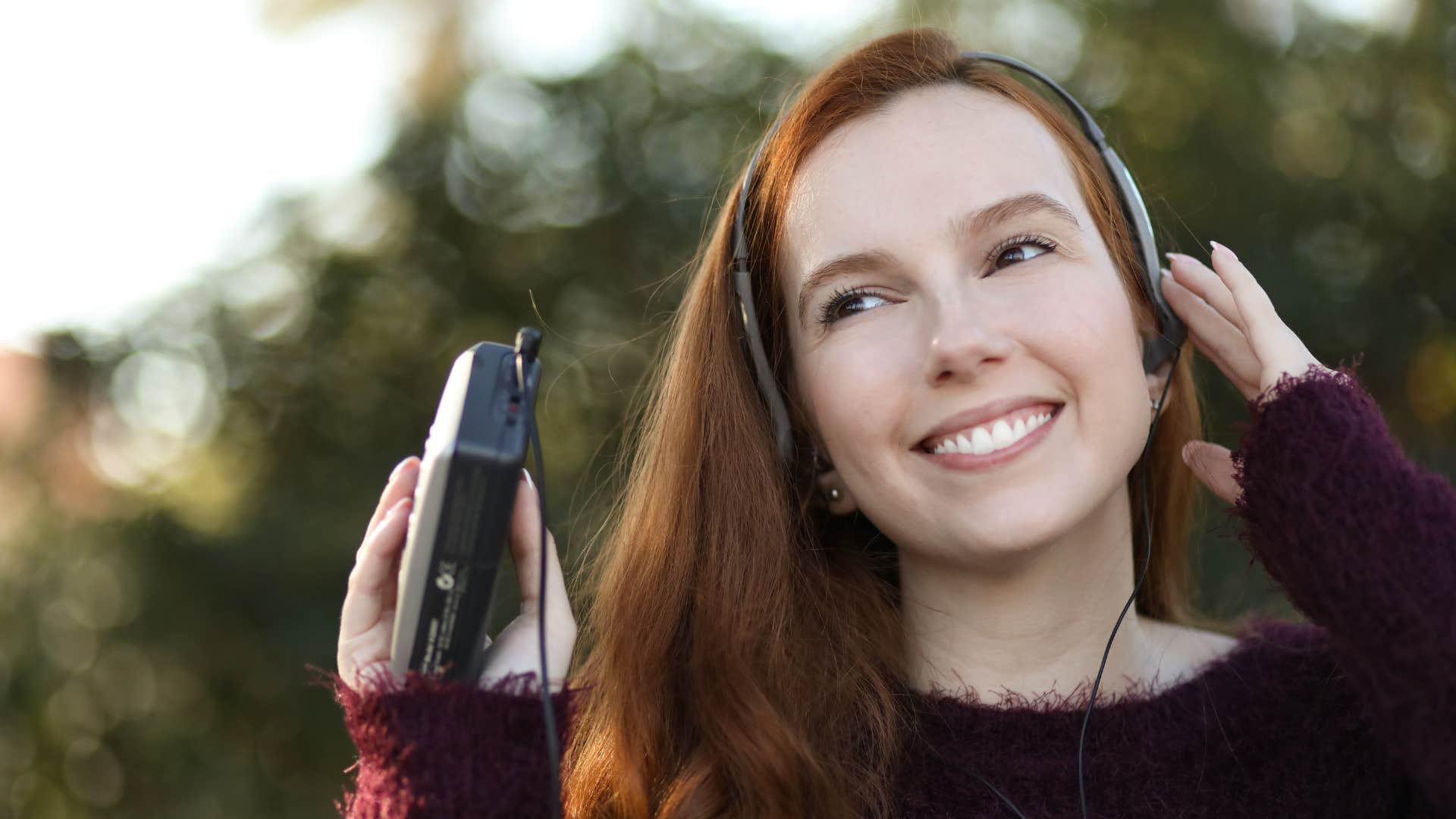 a gen x teen from back in the day listens to music on her walkman