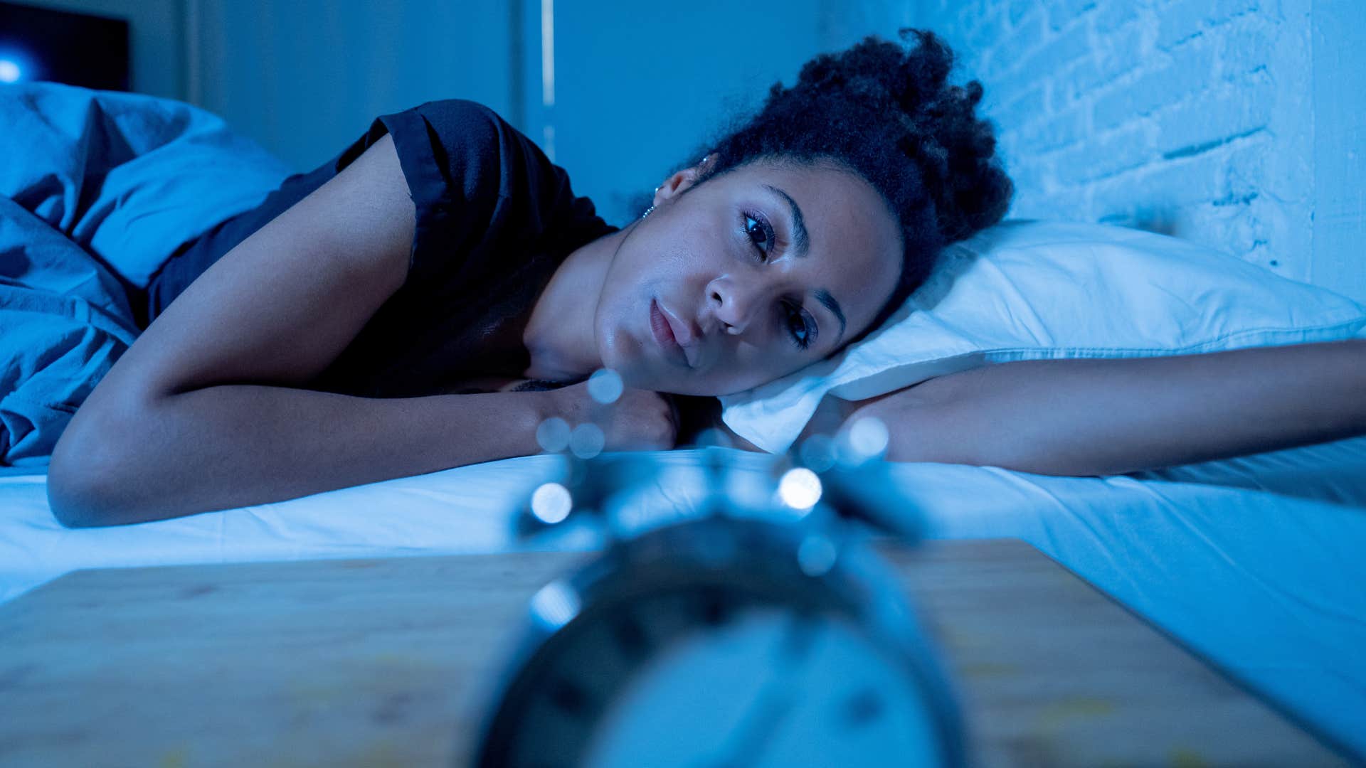 woman who can't stand wasting time looking at clock