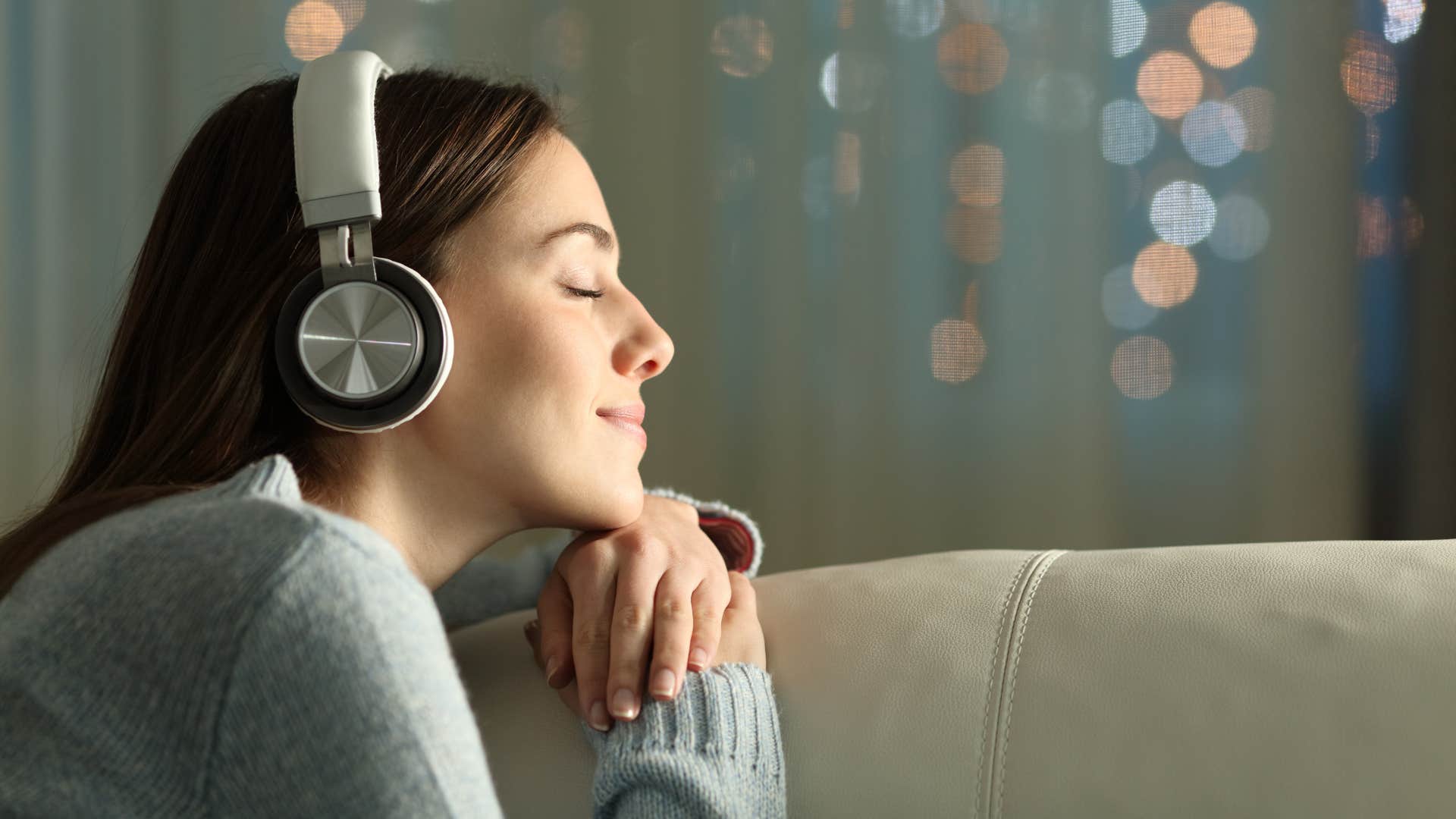 woman in tune with her body listening to music