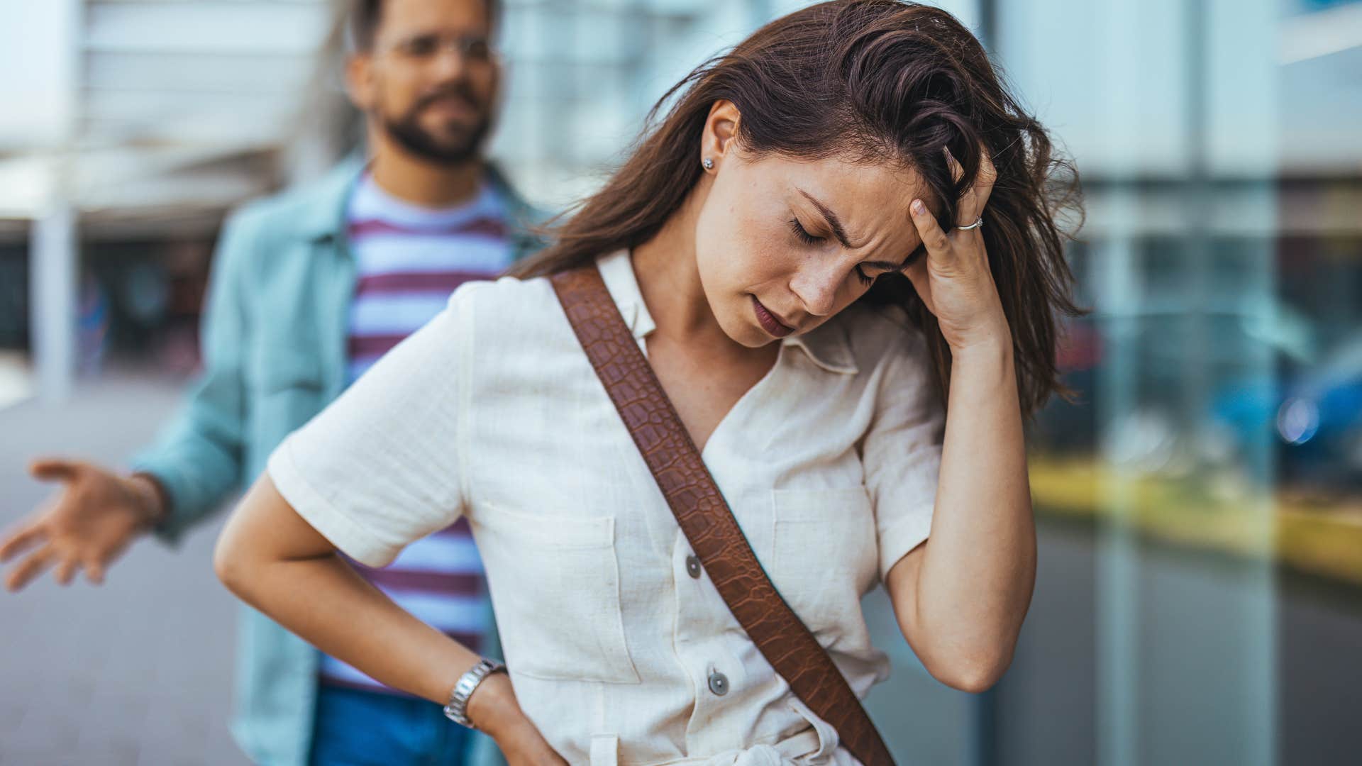 Woman who chases people who aren't meant for them turned away from her partner.
