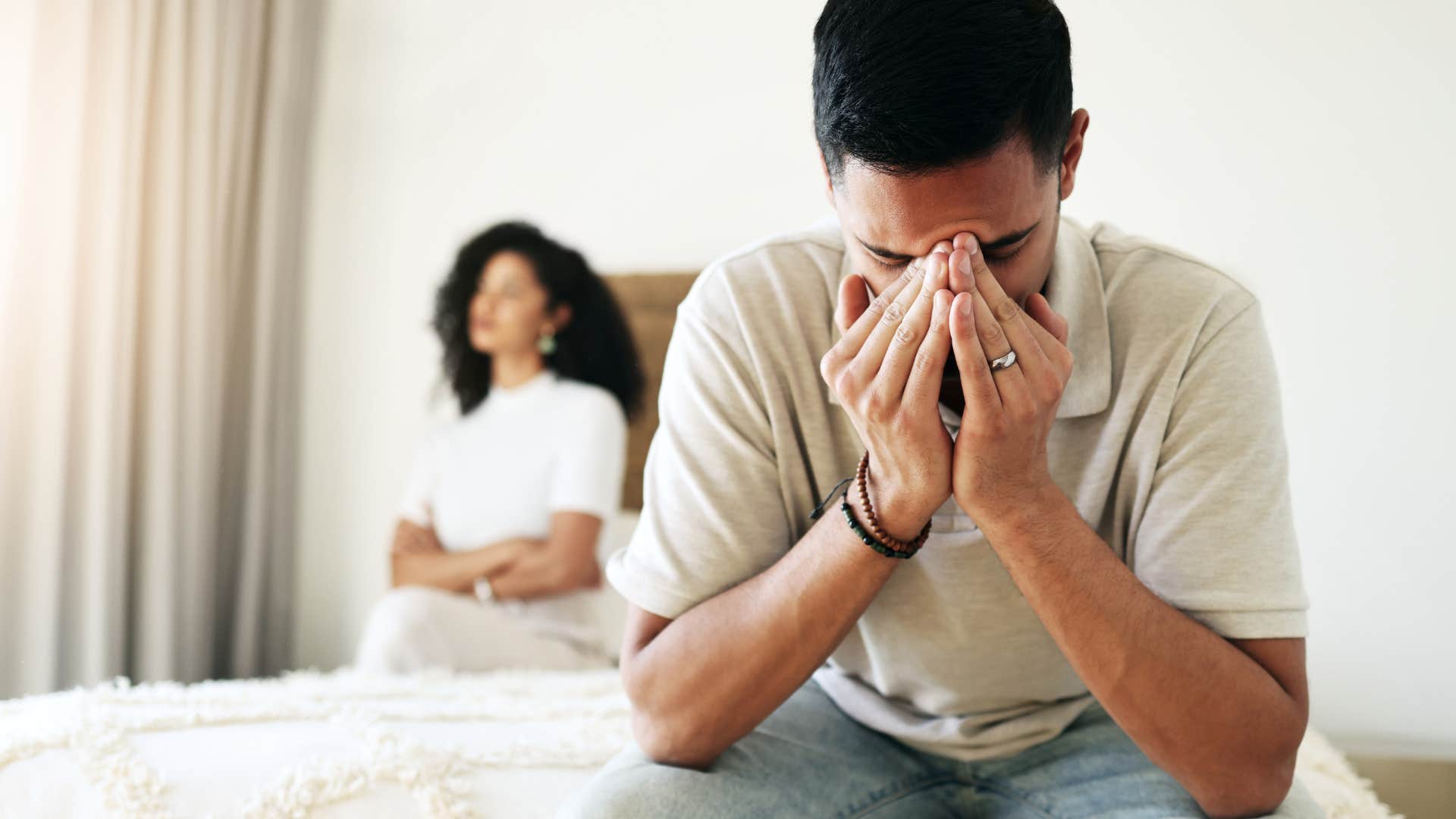 Man who's settling turned away from his partner.