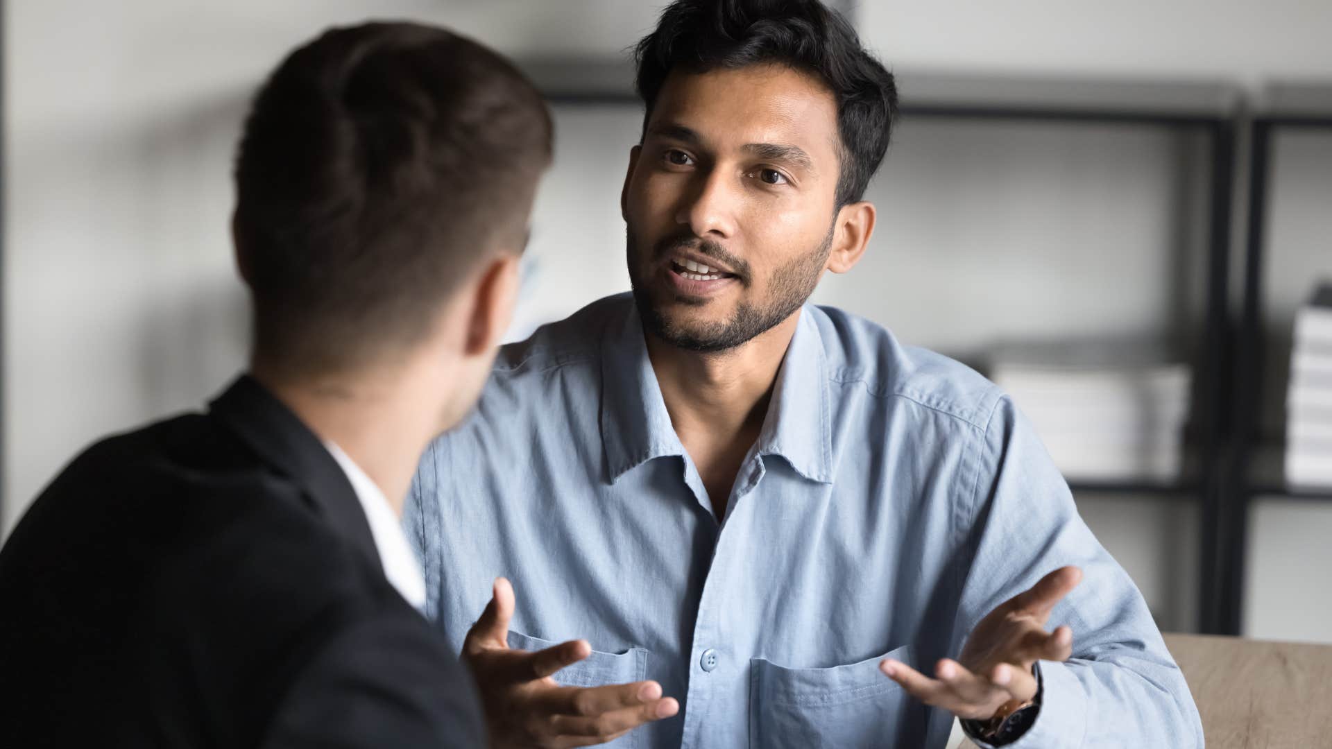 man whose parents taught him to never push back talking to colleague