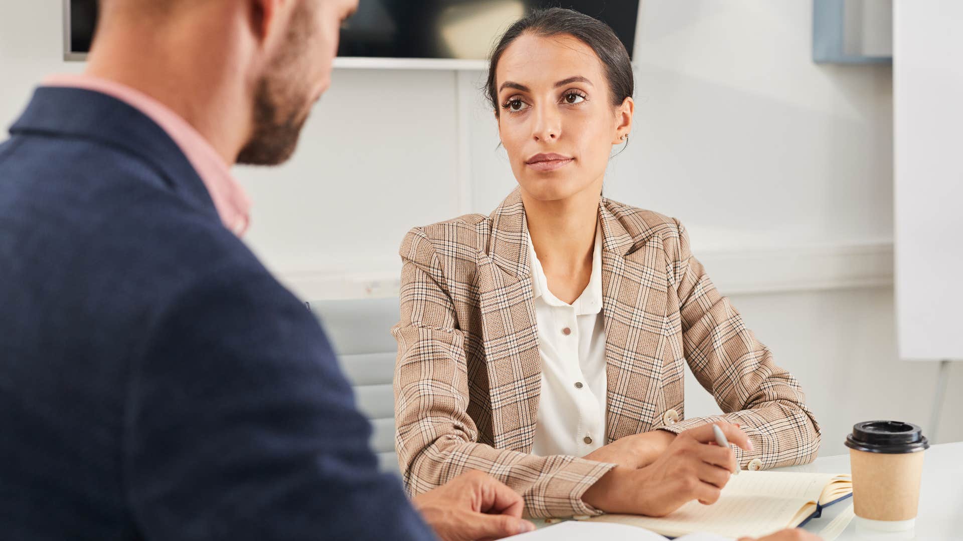 woman who equates obedience with respect looking at her boss