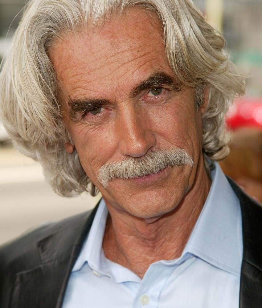 Sam Elliott looks at camera