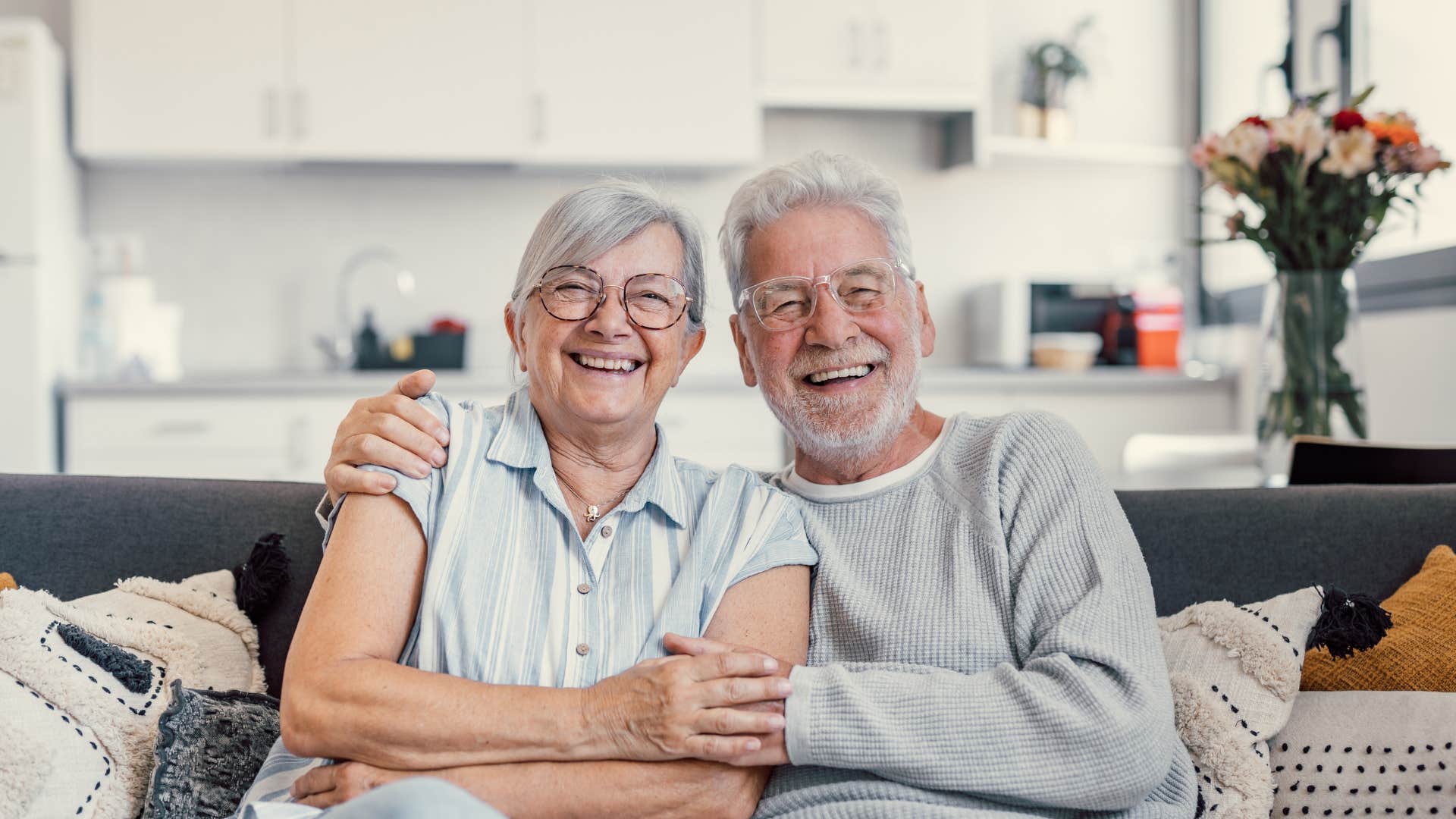 couple cuddling to help lower risk of heart disease