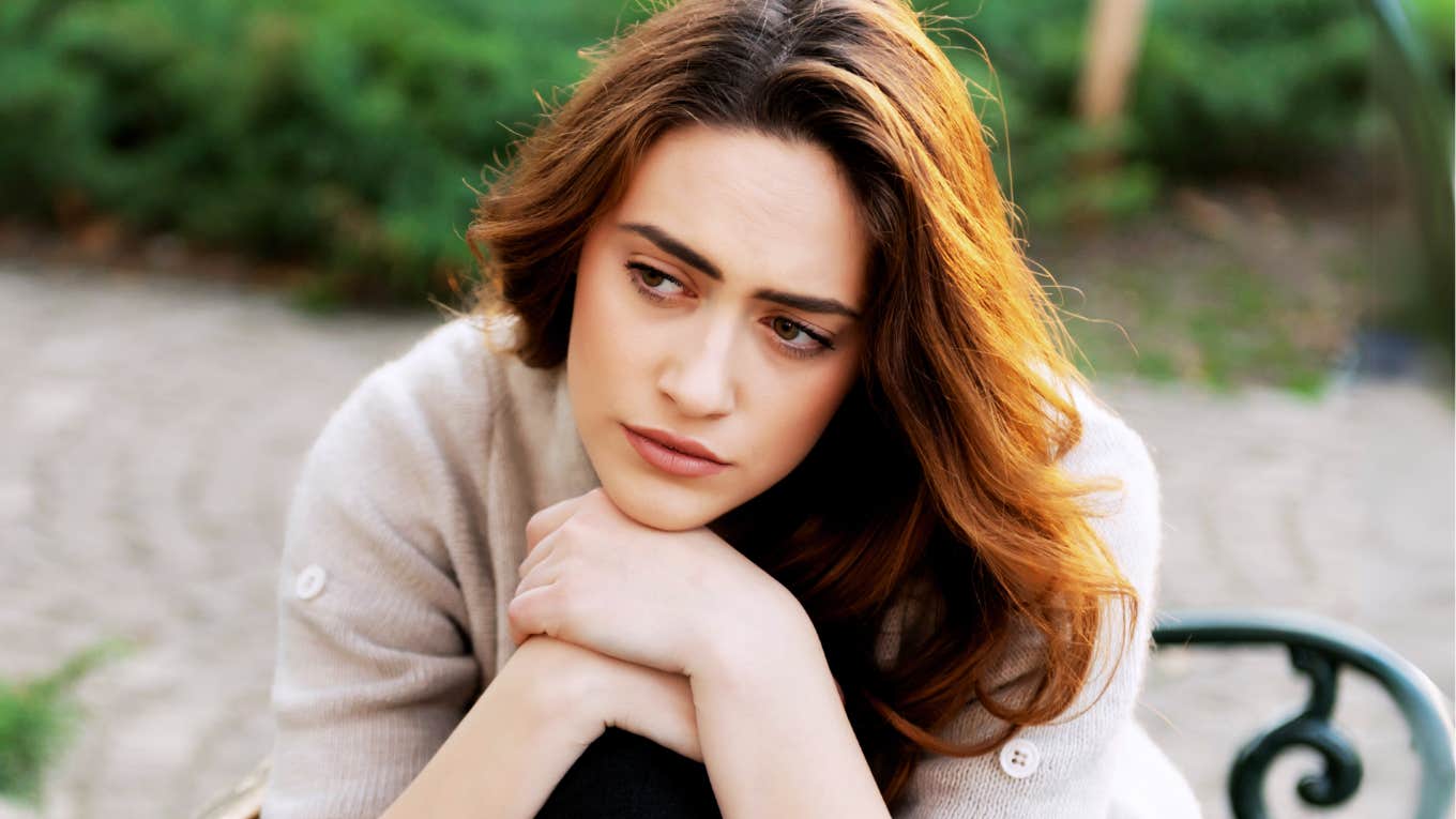 If You’re Seeing These Signs, Research Says Divorce May Be the Healthiest Path Forward Woman seeing signs that divorce may be the healthiest path forward.