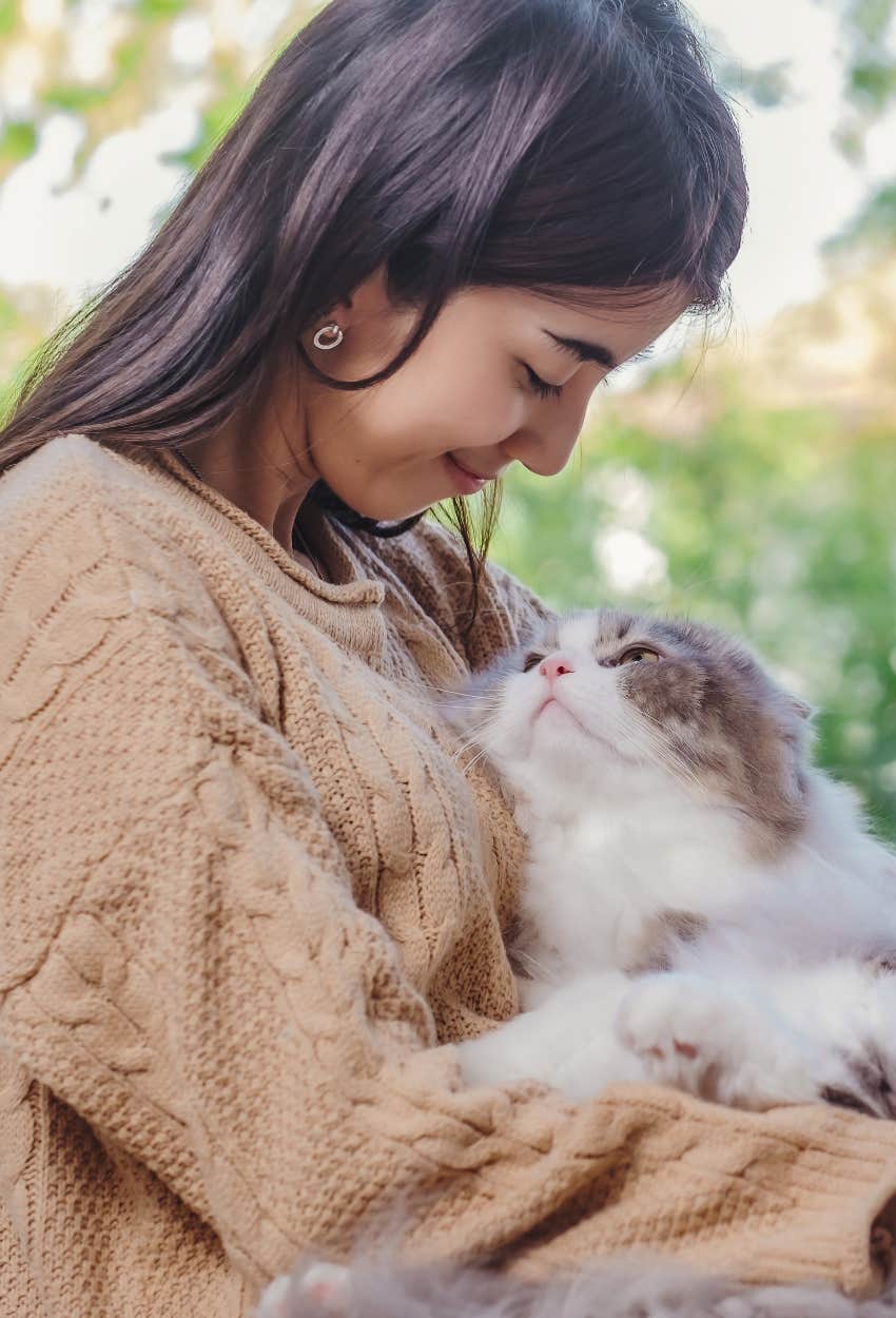 cat obsessed with their owner slow blinking