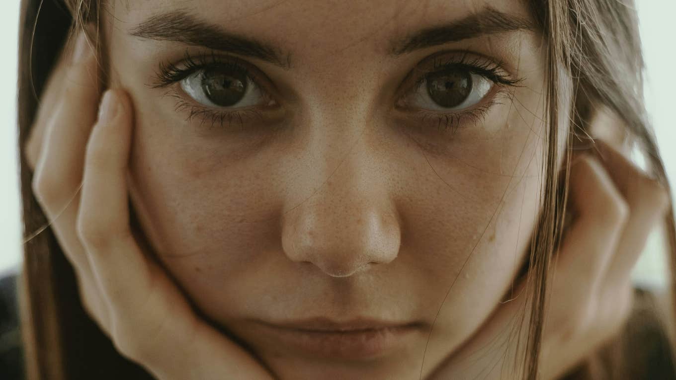 4 Stark Signs Your Family Is Too Close — And Not In A Healthy Way Woman realizes family is unhealthily close.