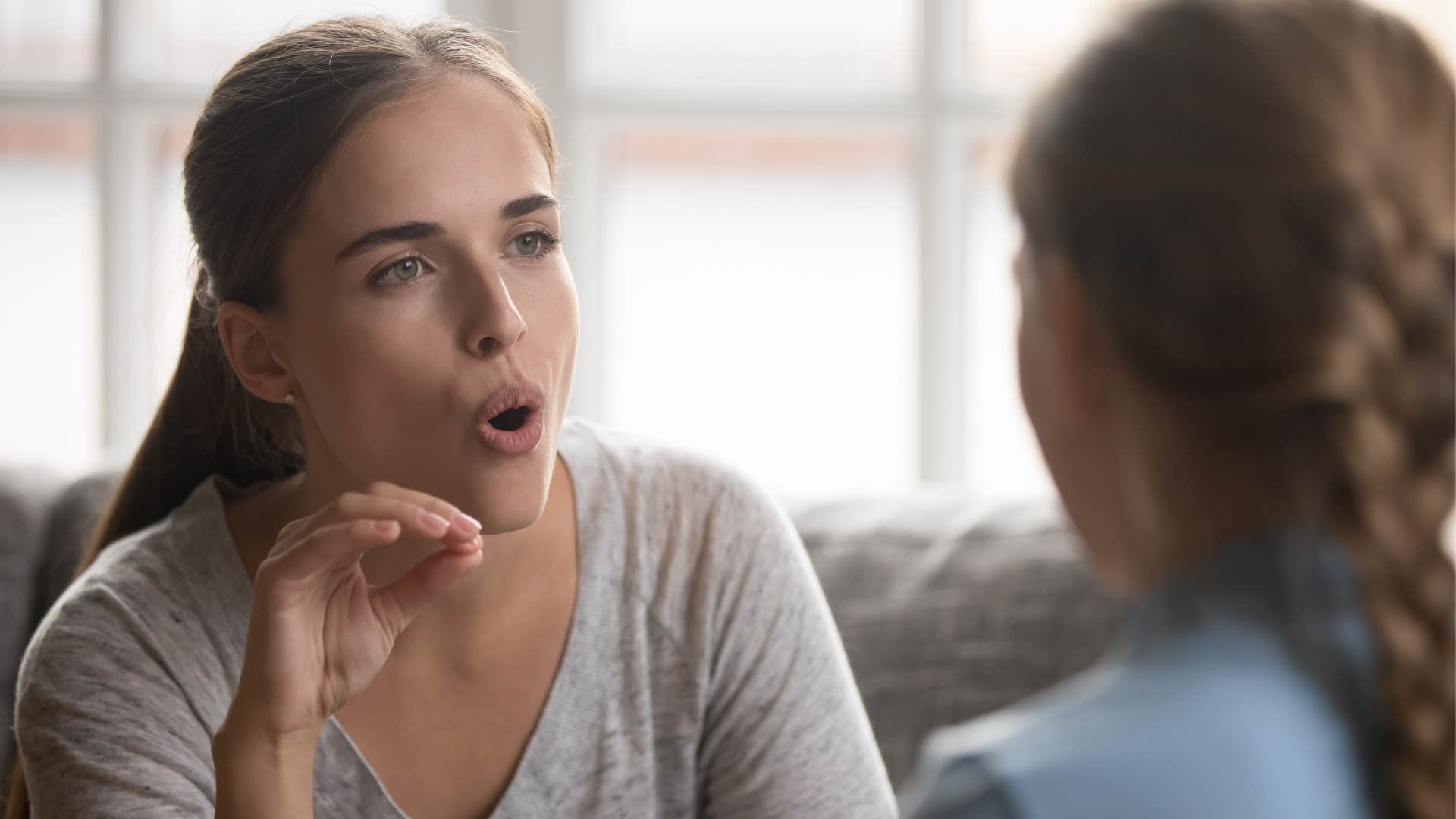 a narcissistic woman berates another woman for giving a better present at a party