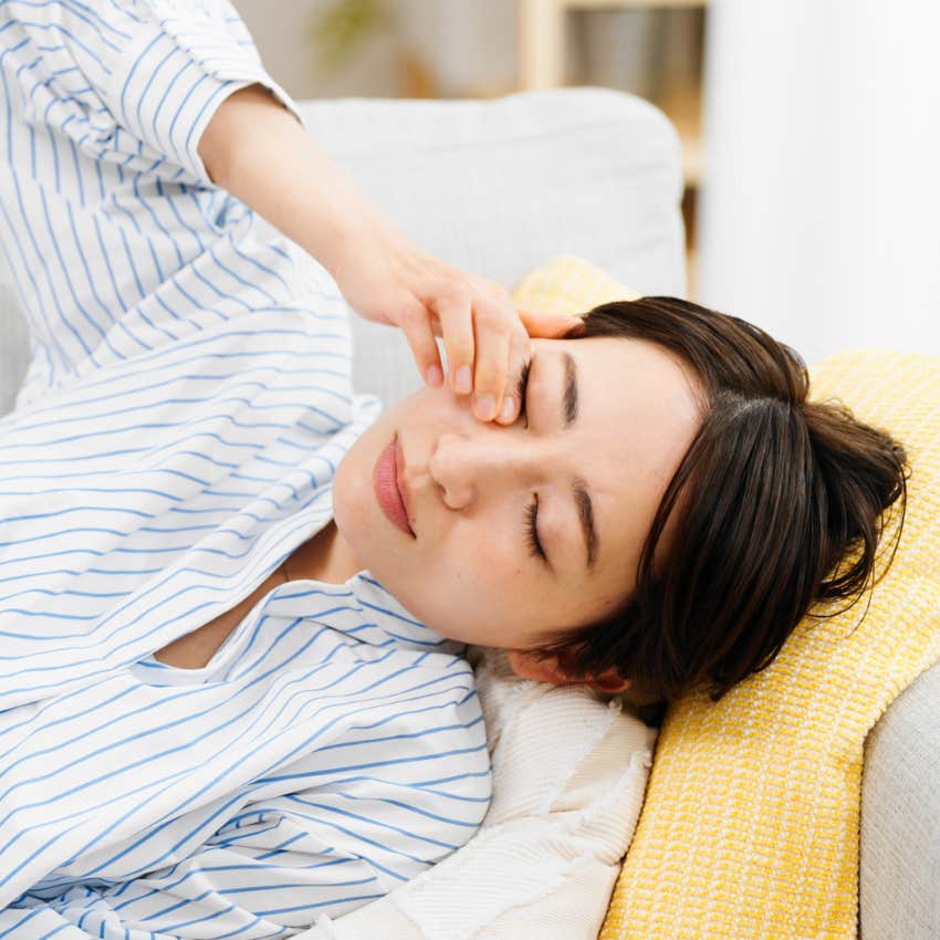 woman recharging by taking a nap