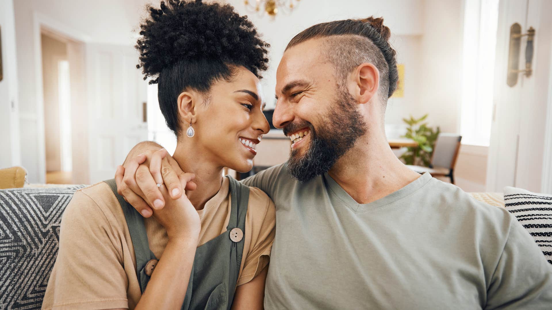 woman actively listening to partner and smiling