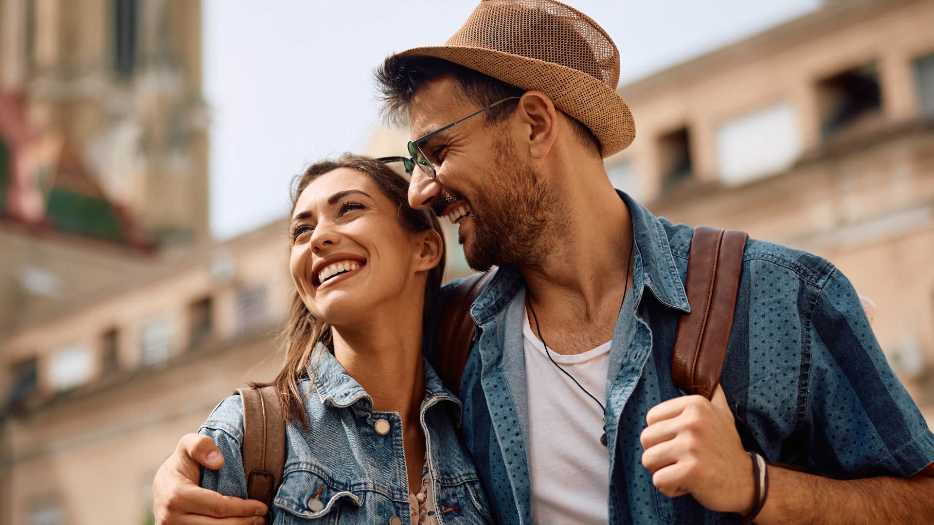 woman encouraging her partner to grow walking and smiling
