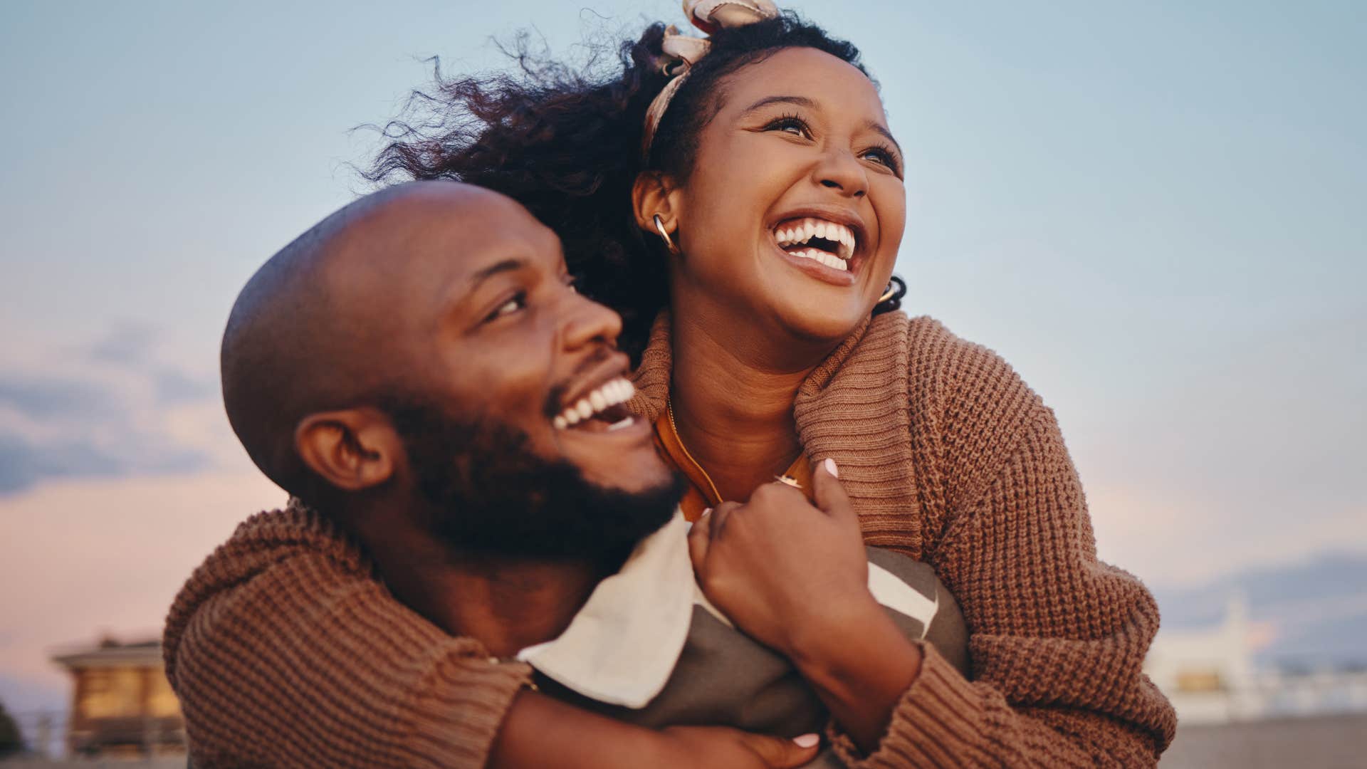 woman who notices her partner's energy hugging him