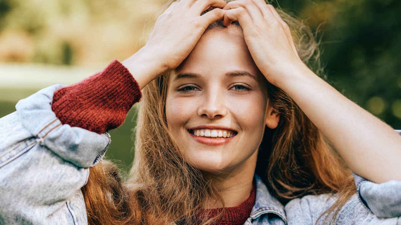 happy woman smiling feeling magical