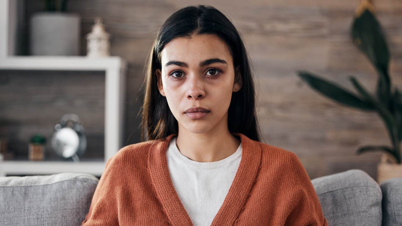Small Things That Overwhelm People Who Feel Everything, According To Research overwhelmed empathic woman who feels everything