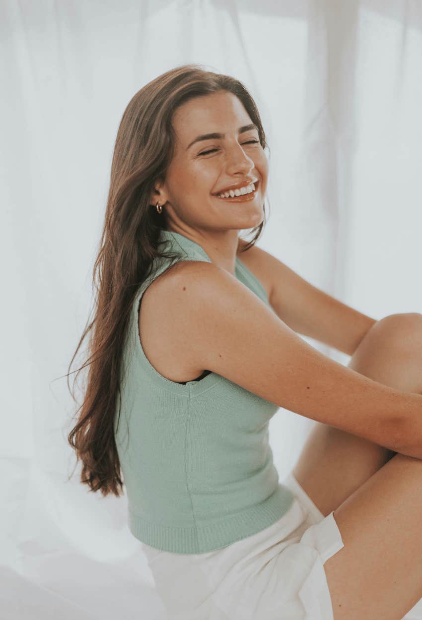 smiling woman showing softness as quality attractive women naturally have