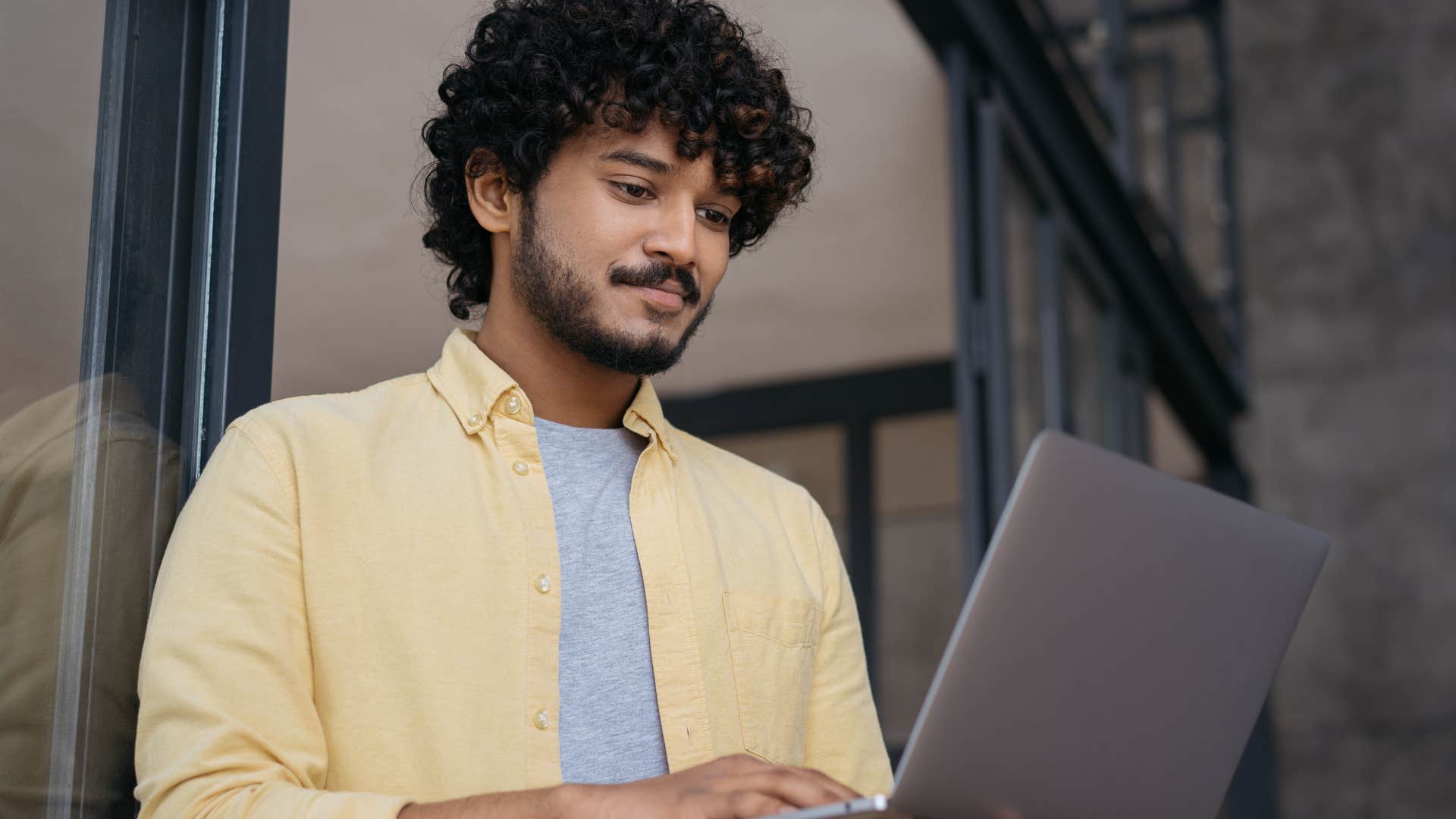 man submitting applications on his laptop
