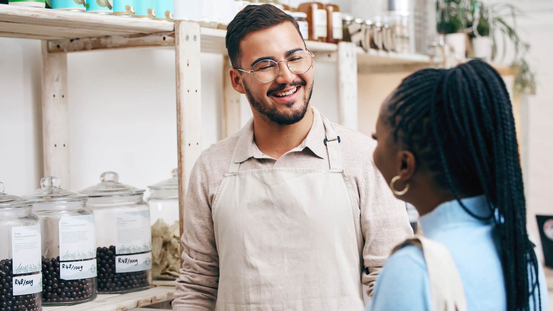 a smart man has awkward social timing when talking with a customer