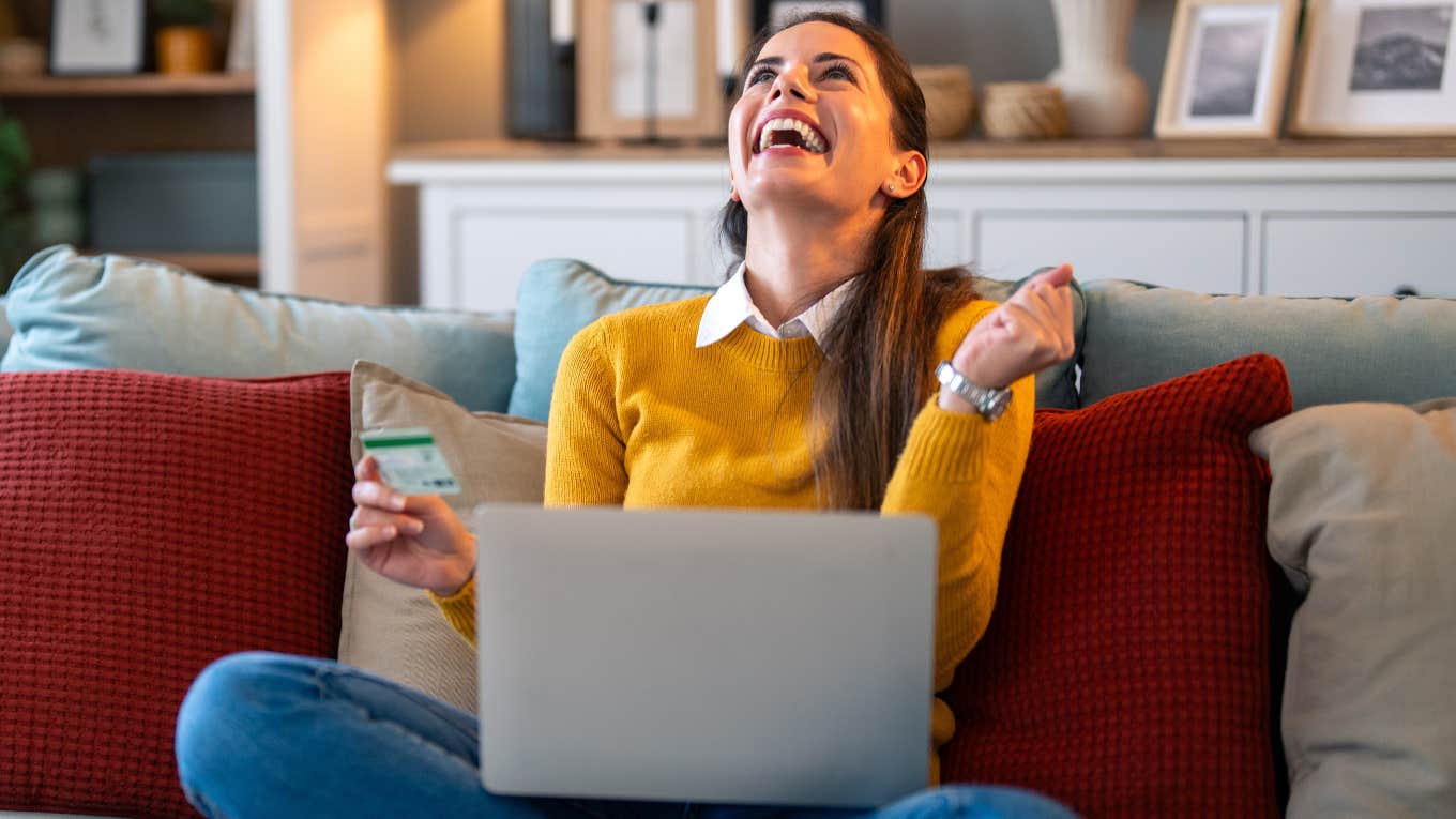 Study Says Spending Money Won’t Make You Happy Unless You Spend It On This Woman spending money on the one thing that will make her happy