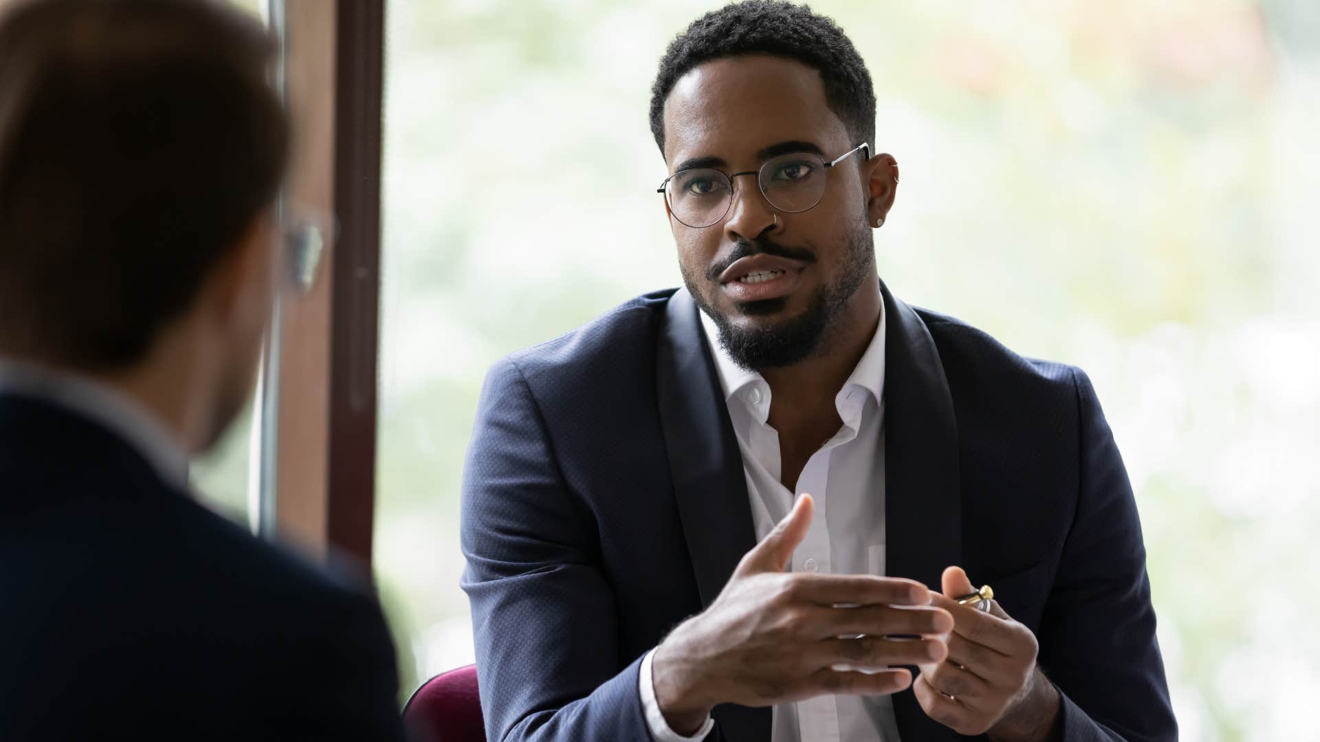 powerful man maintaining eye contact with a co-worker