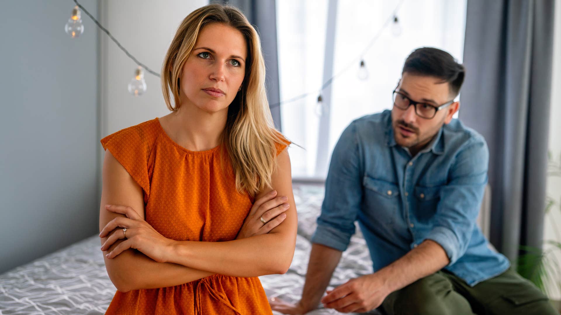 woman who avoids deep conversations turned away from her partner