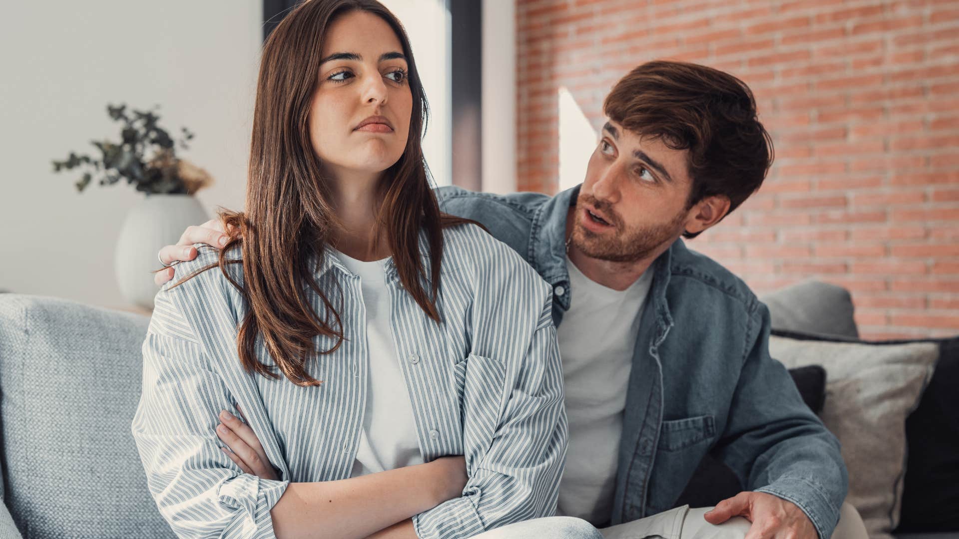 man arguing with his wife who compares him to other men