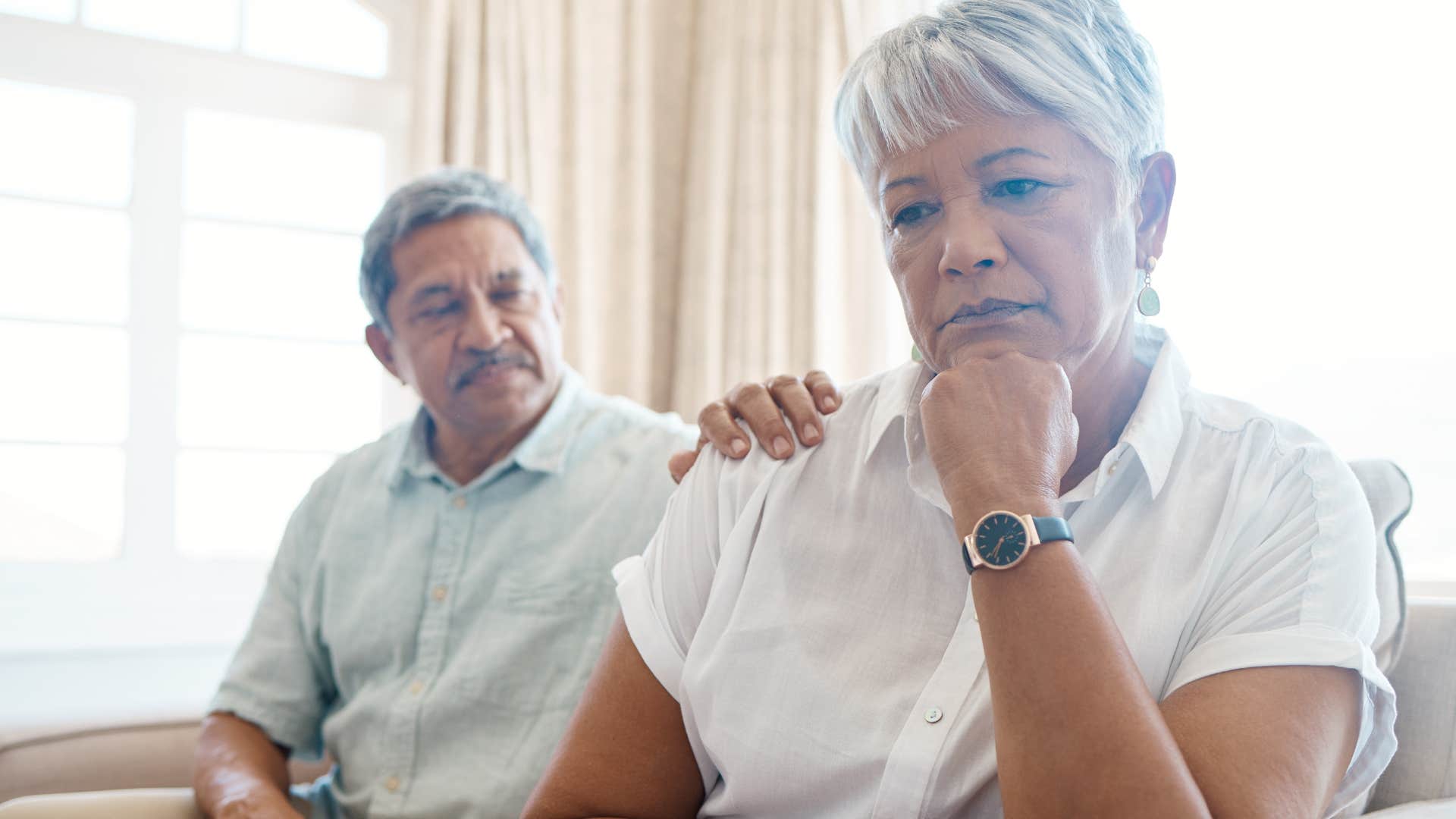 man comforting his wife who constantly criticizes him