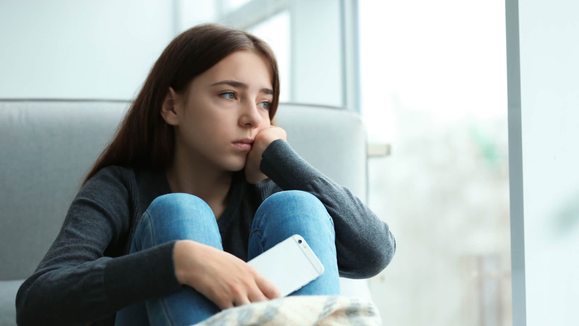 emotionally exhausted woman feeling detached from everything
