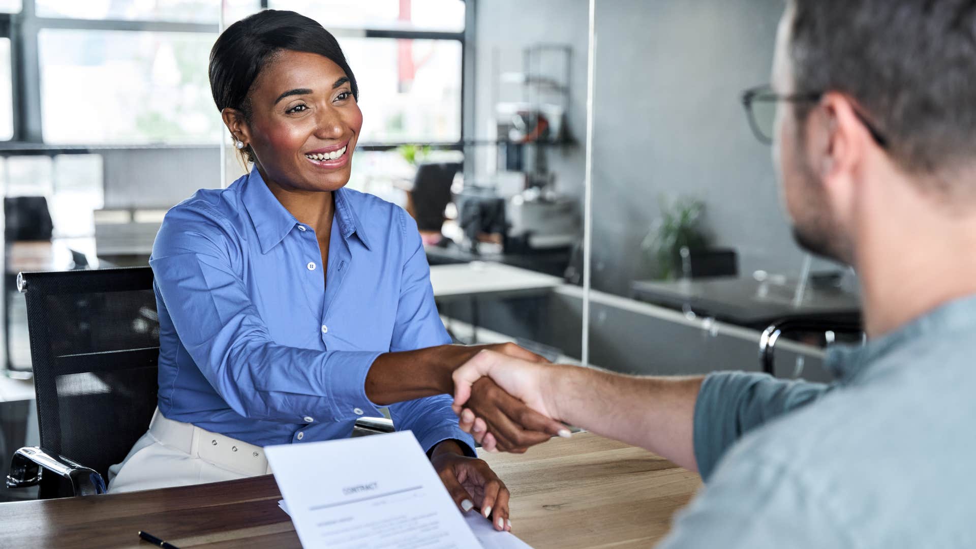 businesswoman speaking fast to get through boring conversation