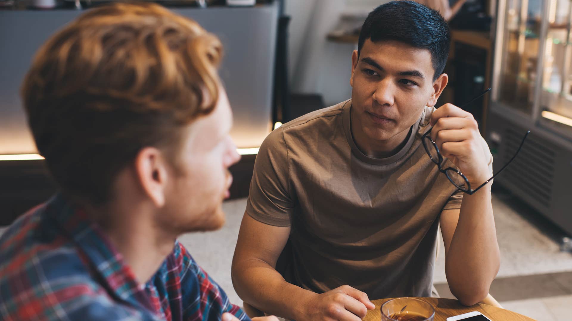 Upset man talking to a friend who can compare them to others.