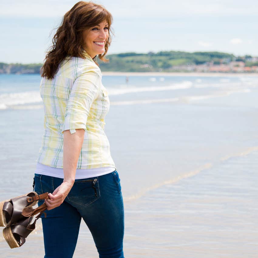 woman with an off-grid beach life and better hair