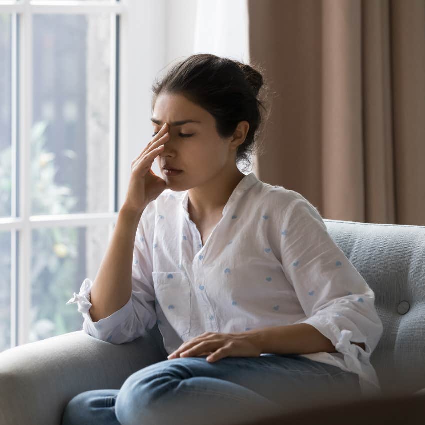 woman stuck in a negative cycle of being defined by the past
