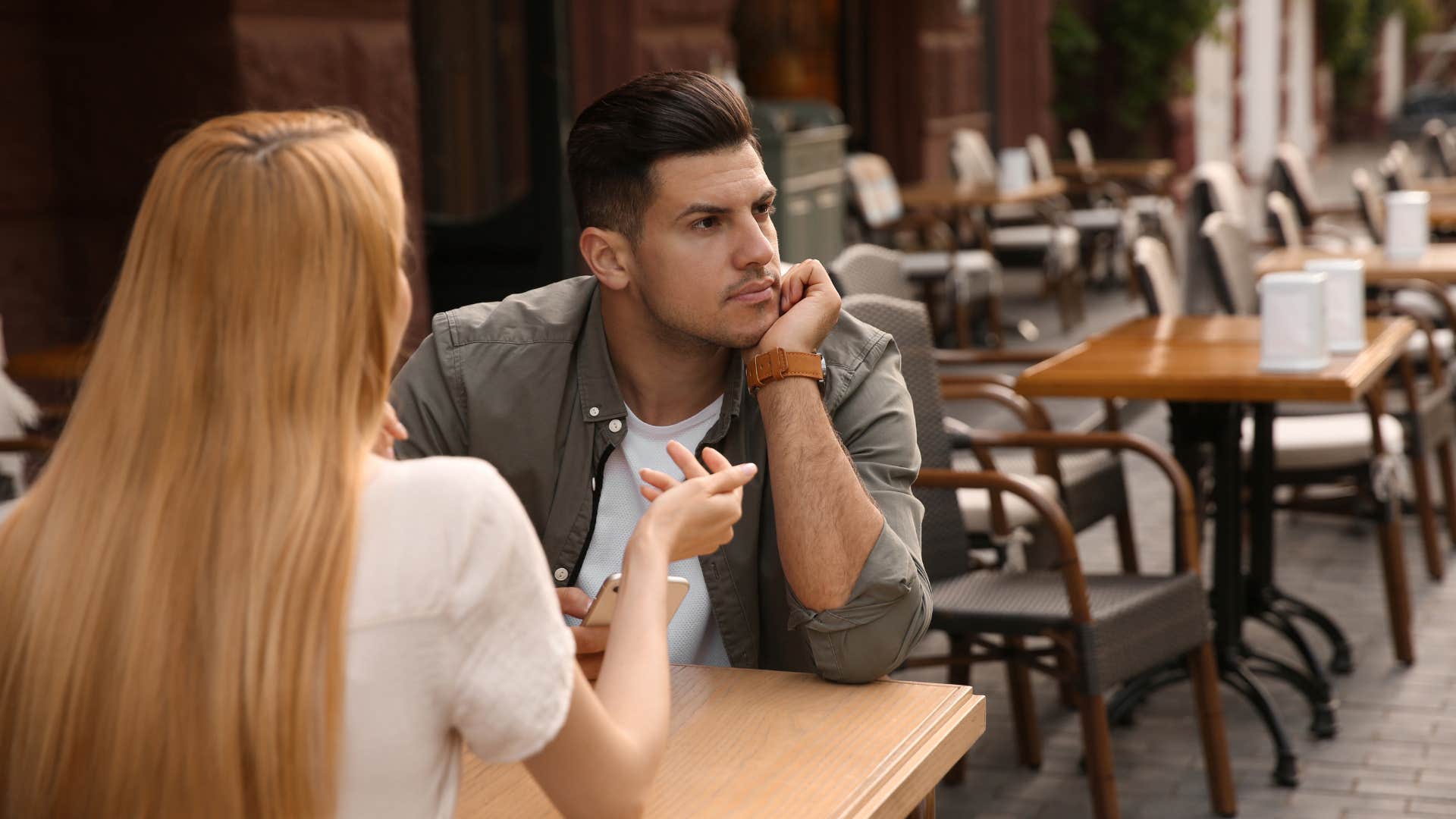 man secretly grossed out by woman ordering something with garlic