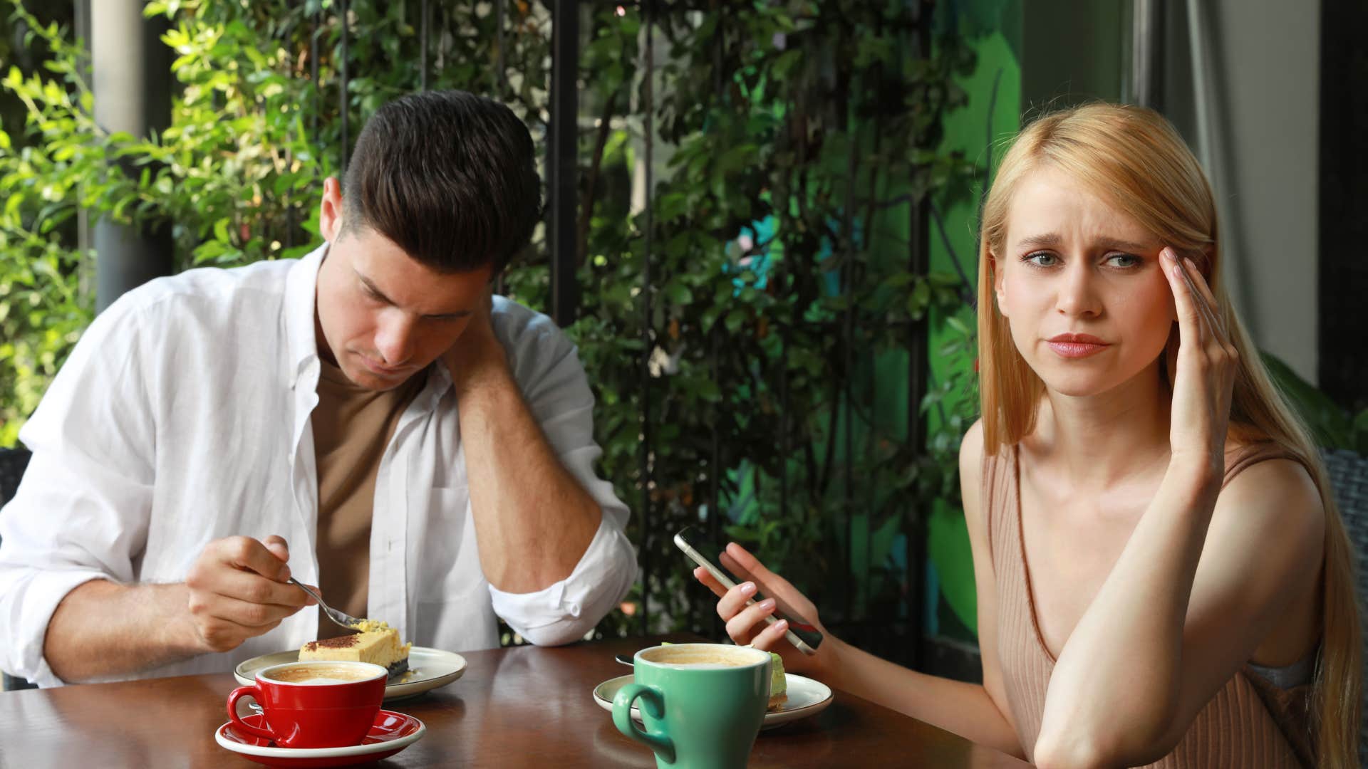 man secretly grossed out by woman updating social media
