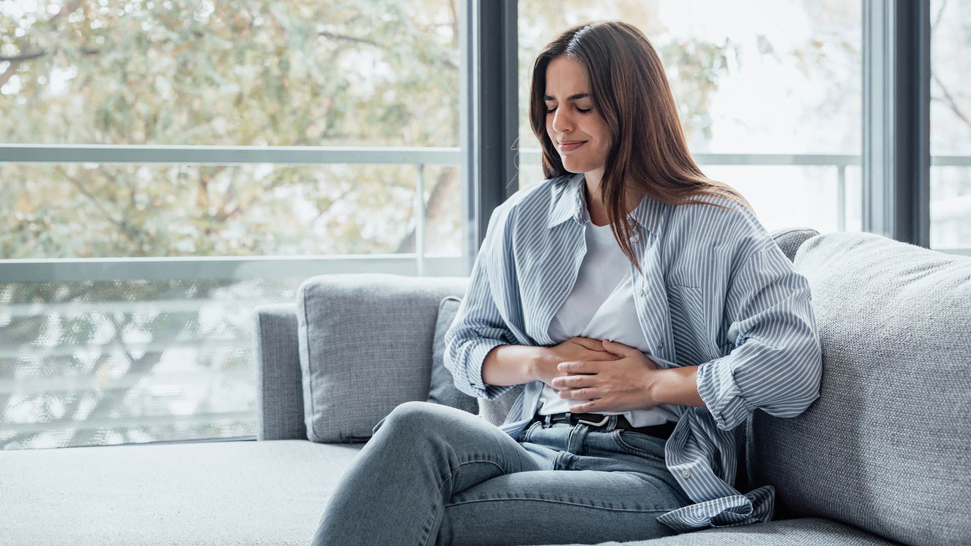 woman expected to work on period as she clutches her stomach in pain