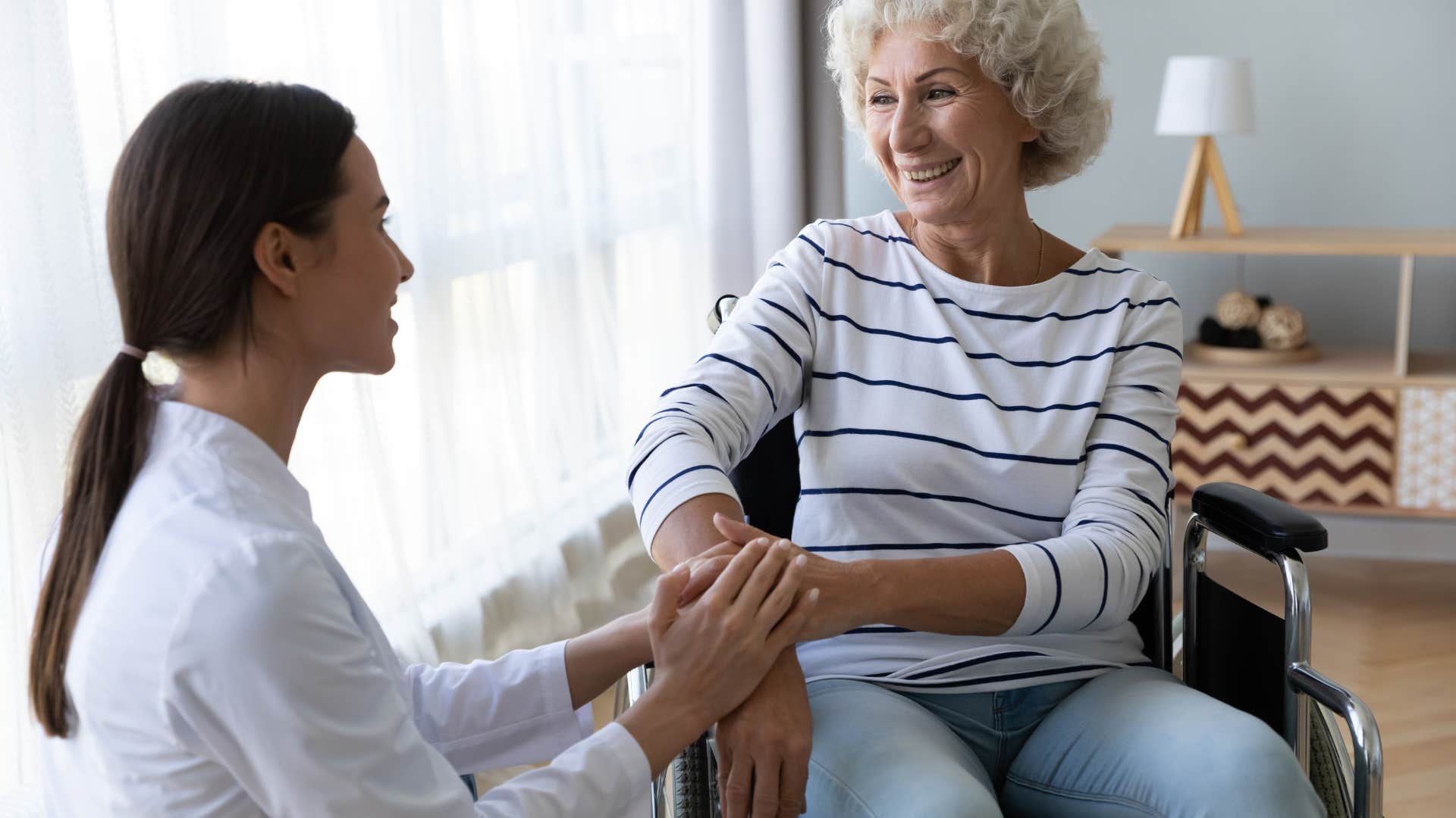 older woman speaking with doctor