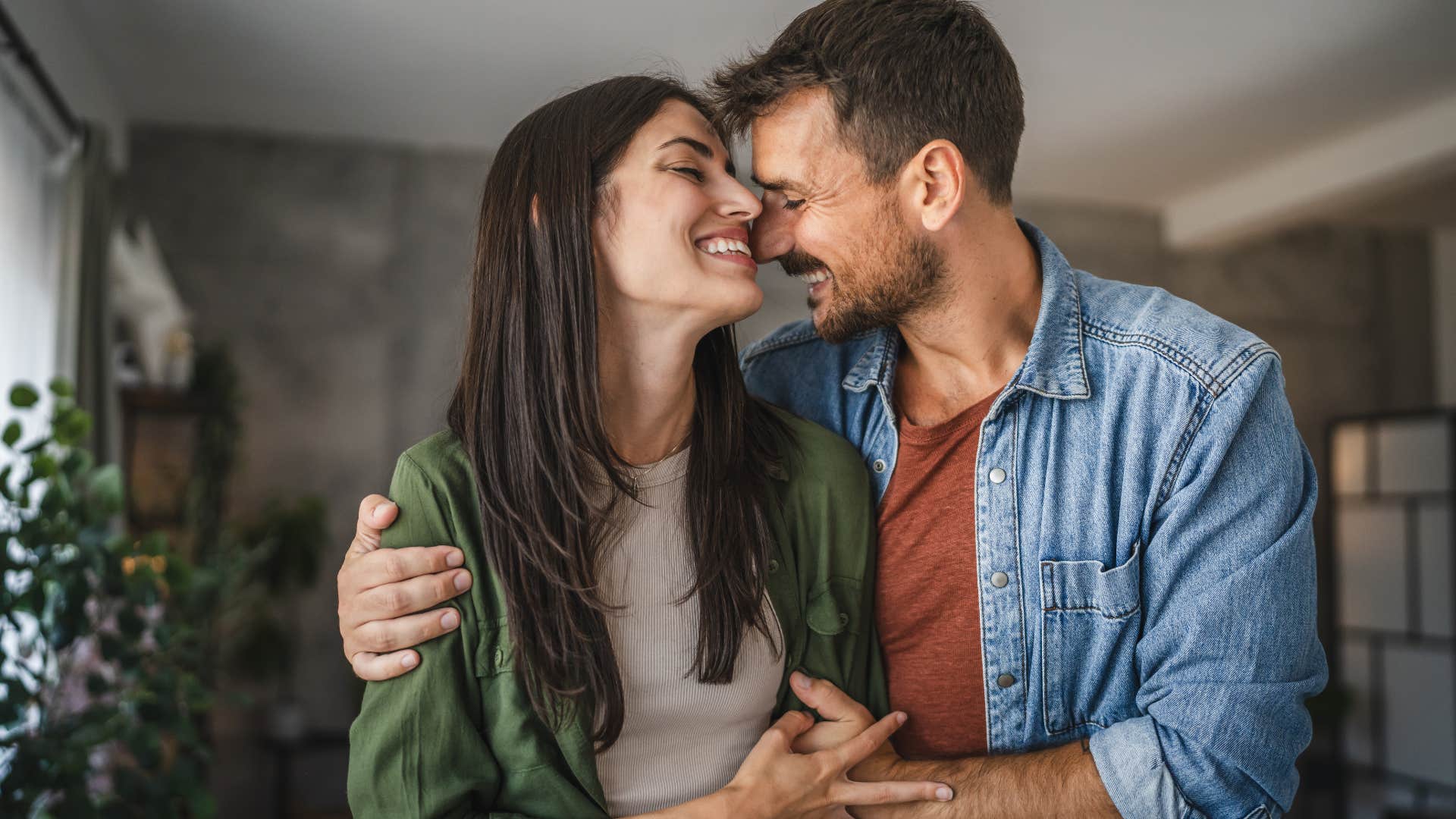 deeply in love couple being super touchy feely