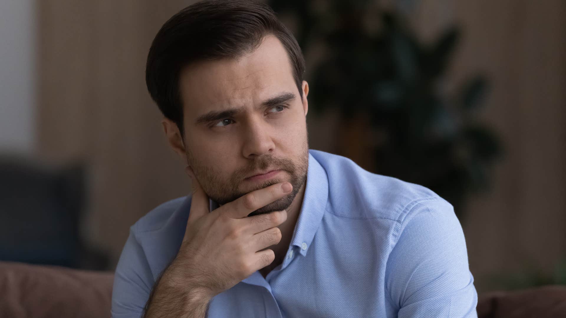 upset man thinking I don't have time for this