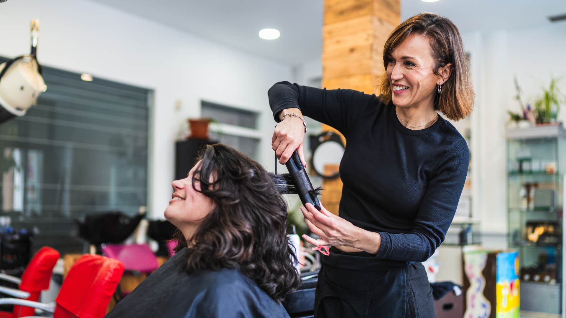 woman getting her hair done at salon