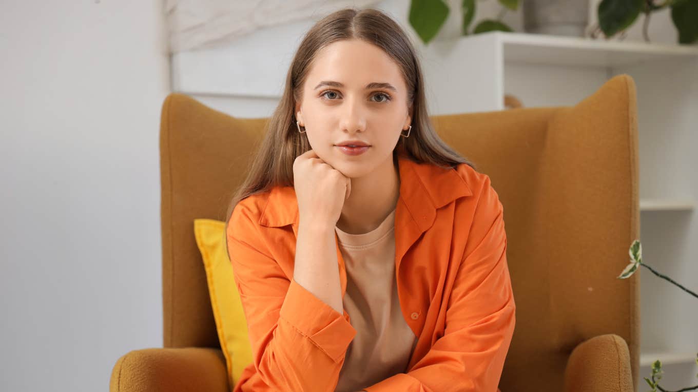 Things Frugal People Keep For Years But Probably Need To Replace frugal woman sitting alone in her living room
