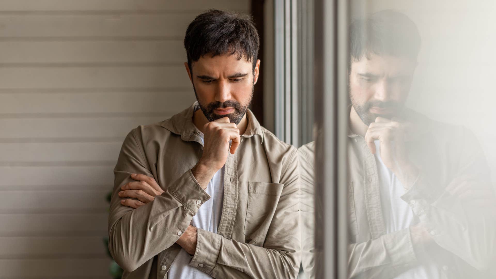 man in brown jacket thinking long term instead of short term