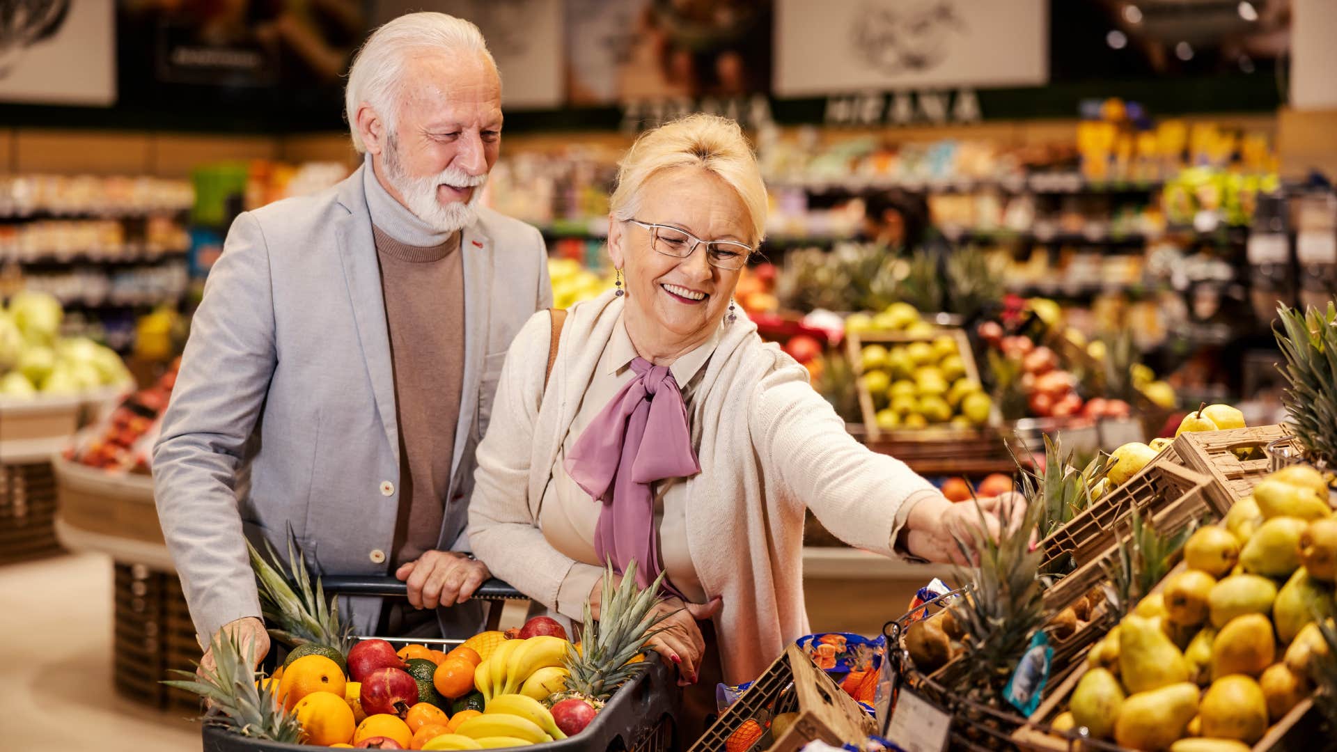 older couple buying items at the store that arent reusable