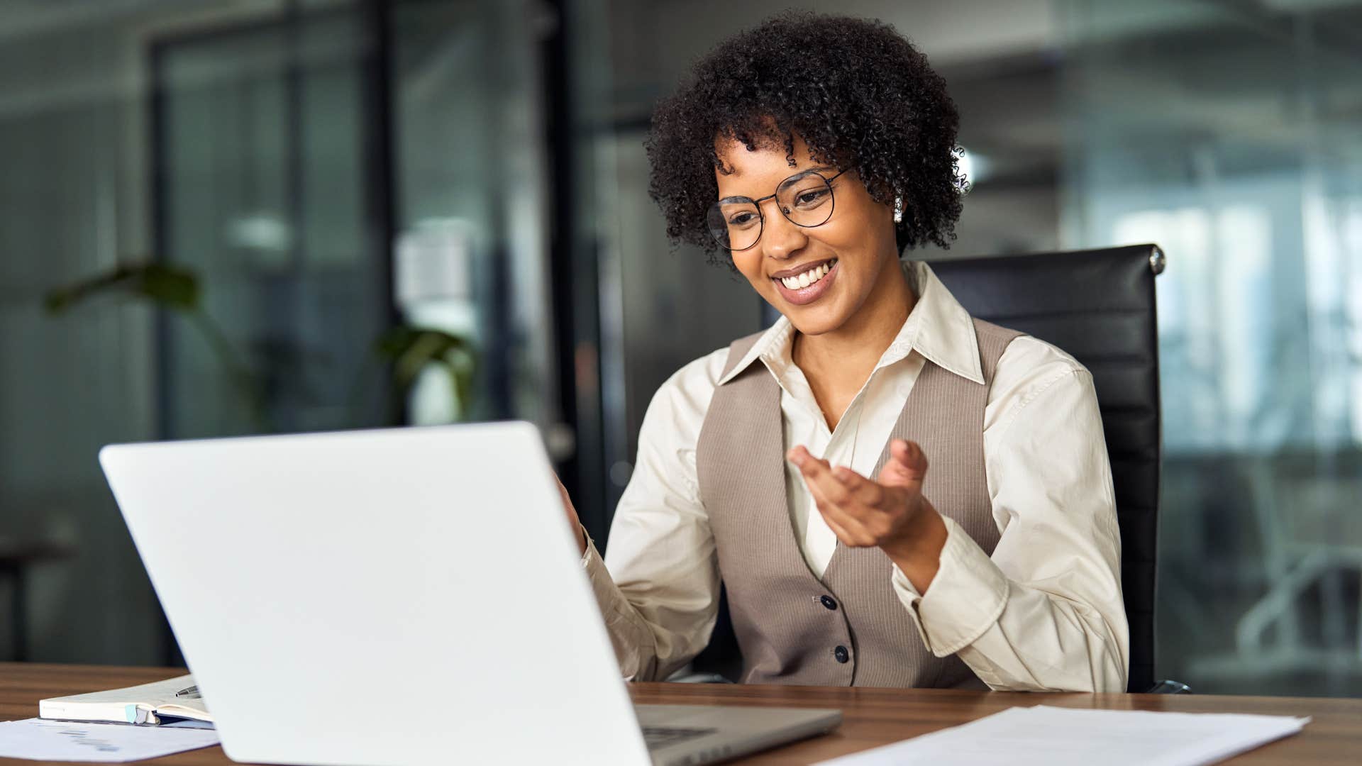 happy woman setting work-life boundaries in the office