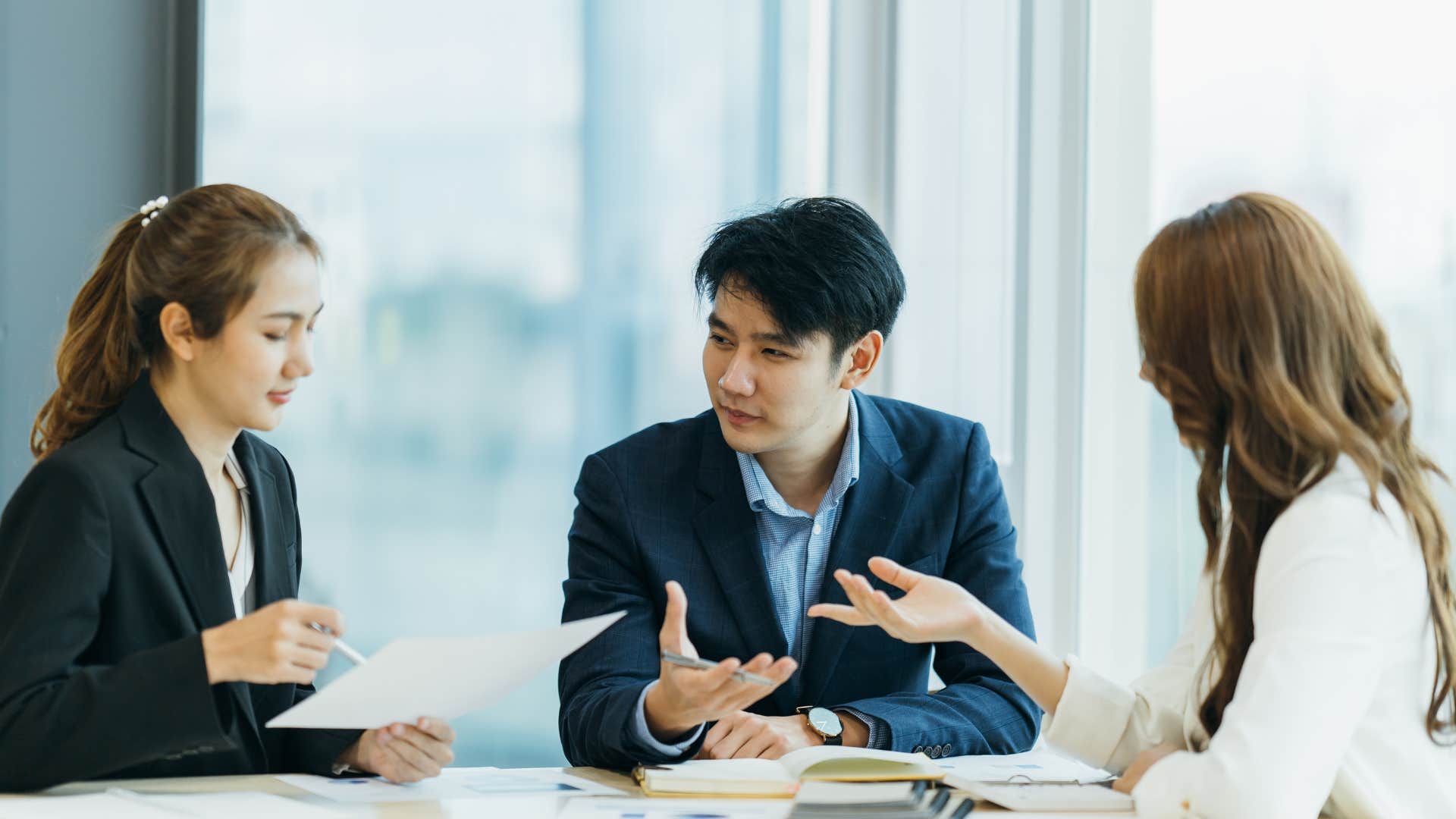 gen z man addressing micro-aggressions from his co-workers