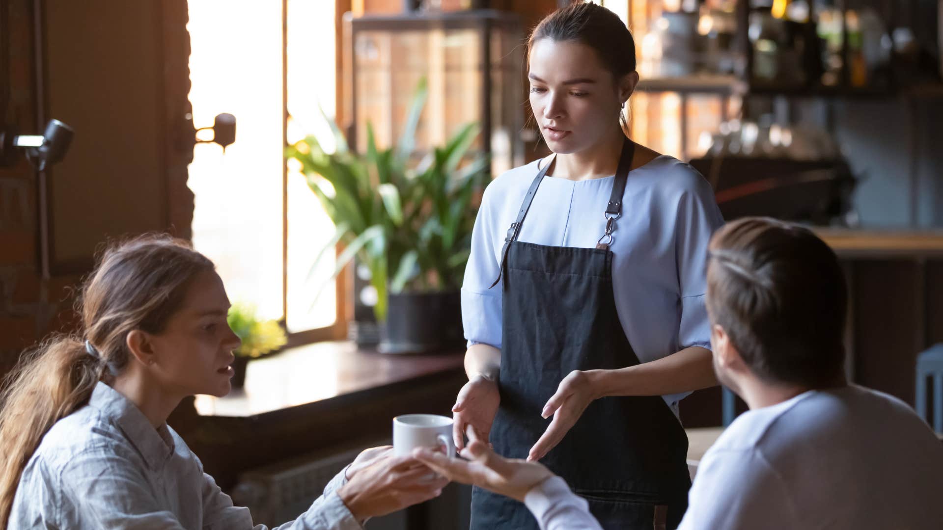 couple treating a server with inferiority