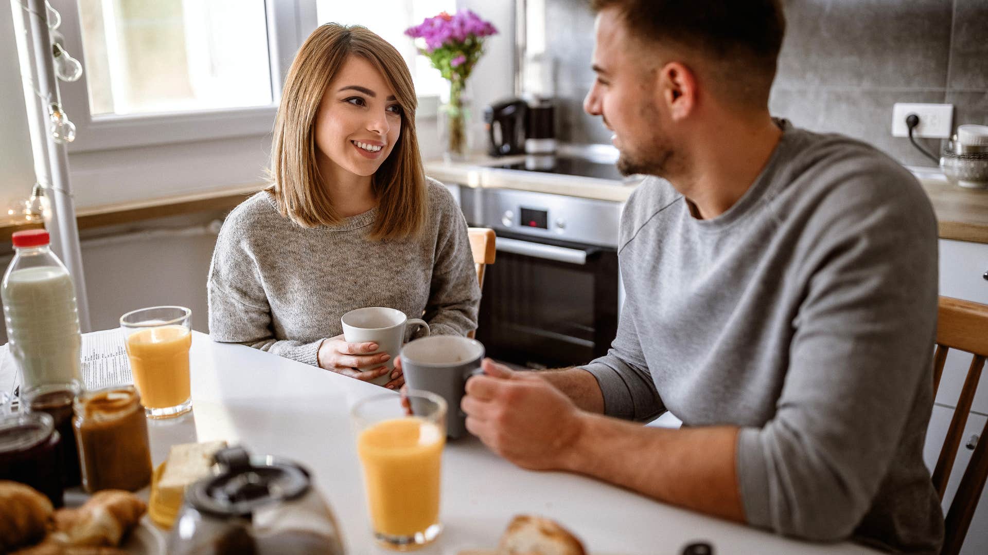 happy couple checking in with each other emotionally before 9 AM